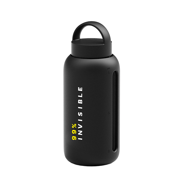 A matte black water bottle with a handle lid and vertical text reading ‘99% Invisible’ in white and yellow lettering.