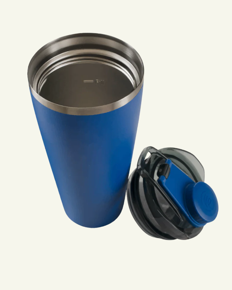 Blue FlaskKap tumbler featuring 'the highway' text and a screw top lid.