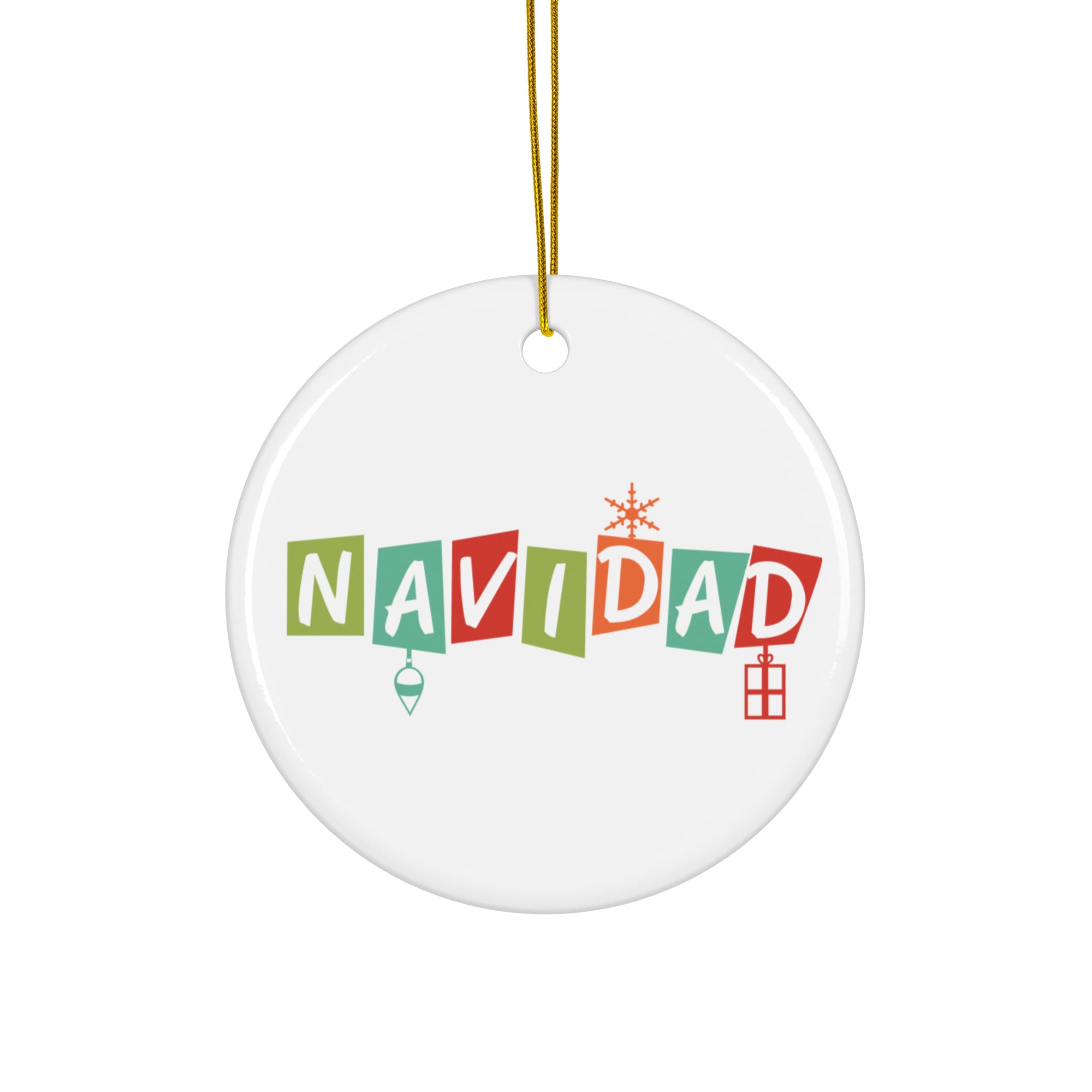 White ceramic ornament with a gold hanging string, showing the word ‘NAVIDAD’ in playful red, green, and blue block letters, decorated with holiday icons including an ornament, a snowflake, and a gift box.