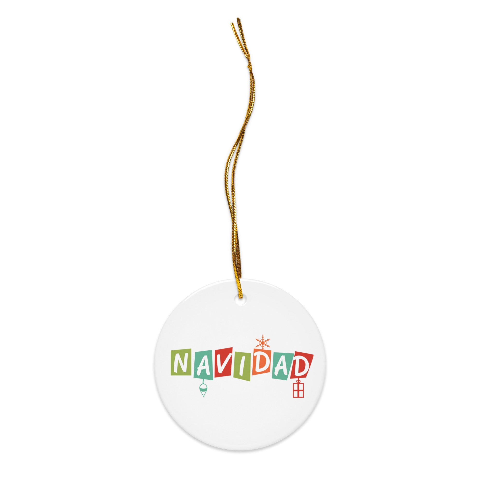 White round ceramic ornament with a gold hanging string, featuring the word ‘NAVIDAD’ in colorful block letters—green, teal, red, and orange—decorated with a small ornament, snowflake, and gift box.