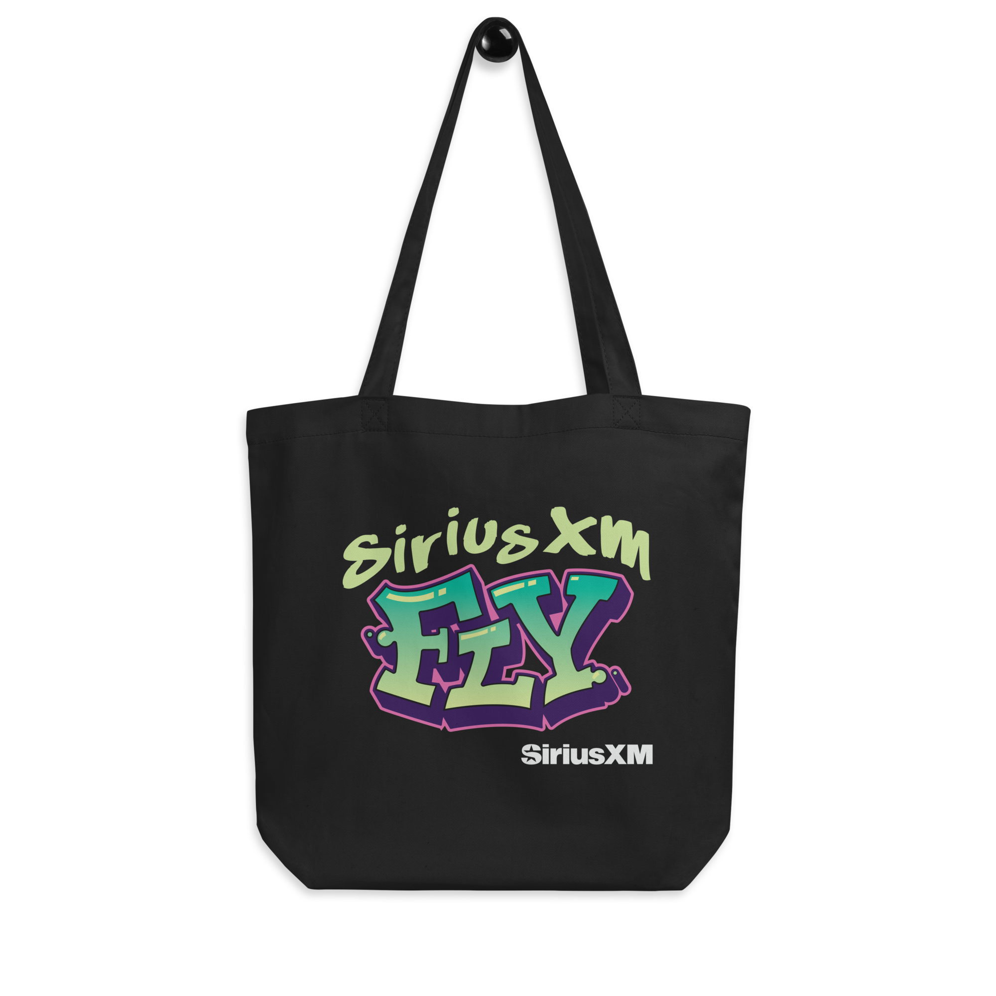 Black tote bag featuring the text 'SiriusXM FLY' in vibrant graffiti-style lettering. Colors include blue, green, and pink.