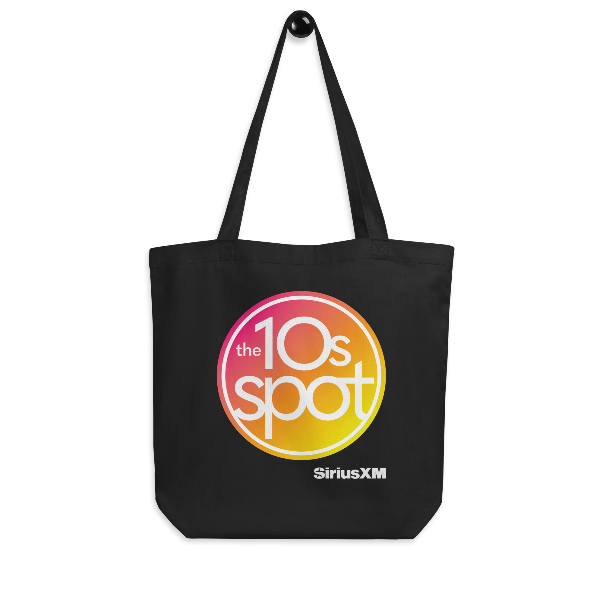 Black tote bag featuring 'the 10s spot' logo in vibrant pinks and oranges and 'SiriusXM' branding in white.