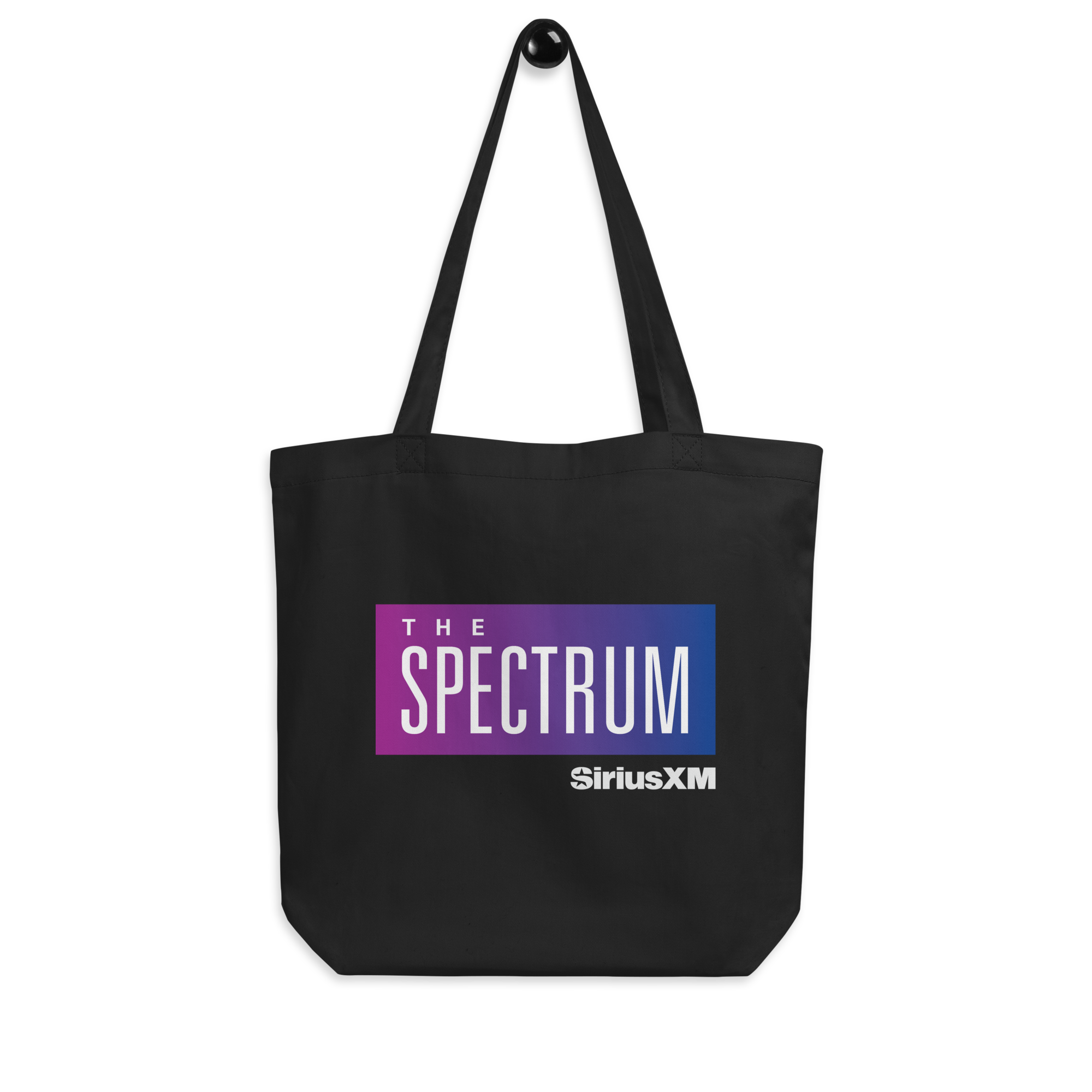 Black tote bag featuring 'THE SPECTRUM' logo in a purple to blue gradient and 'SiriusXM' text in white.