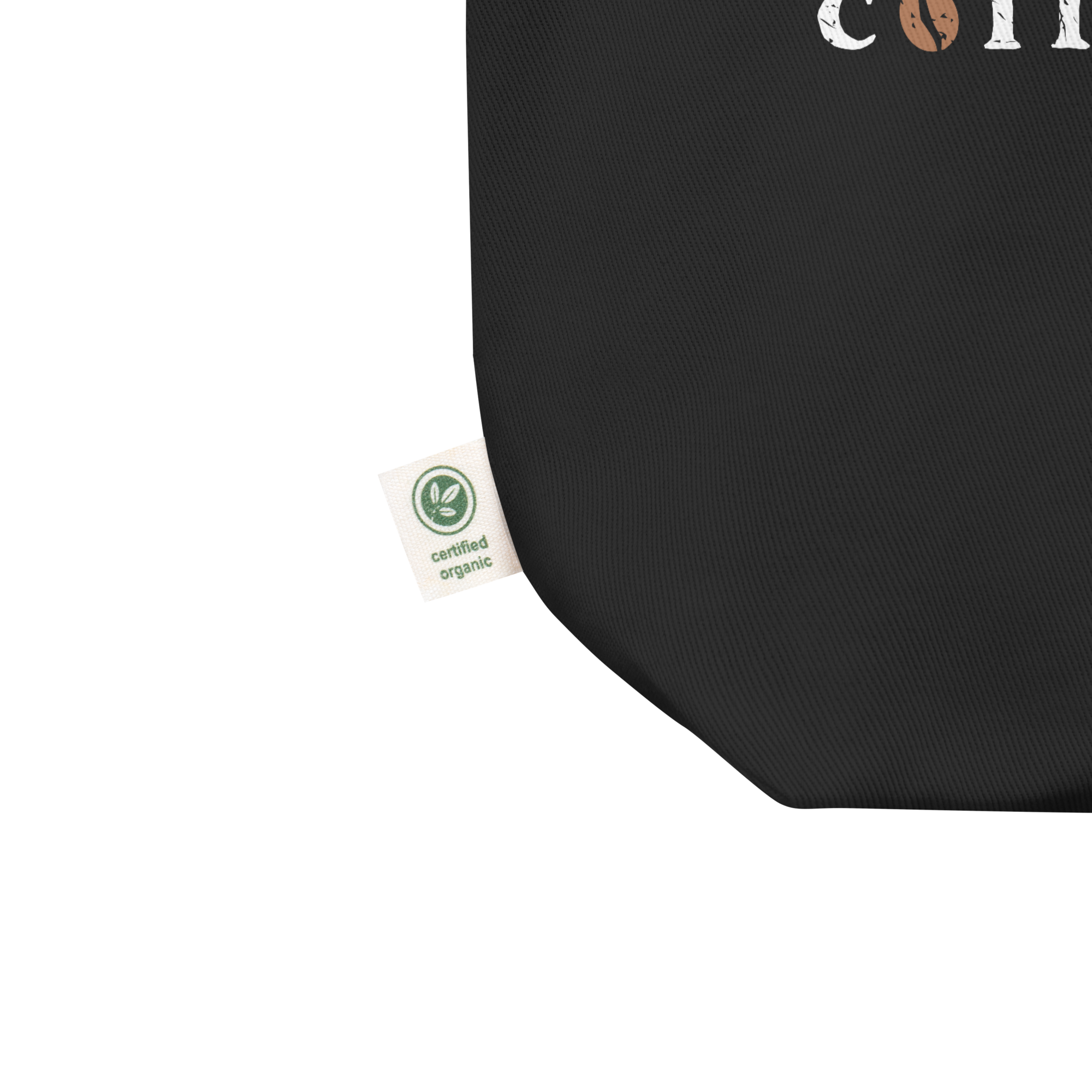 Close up of black fabric tote featuring a tag that reads 'certified organic.'