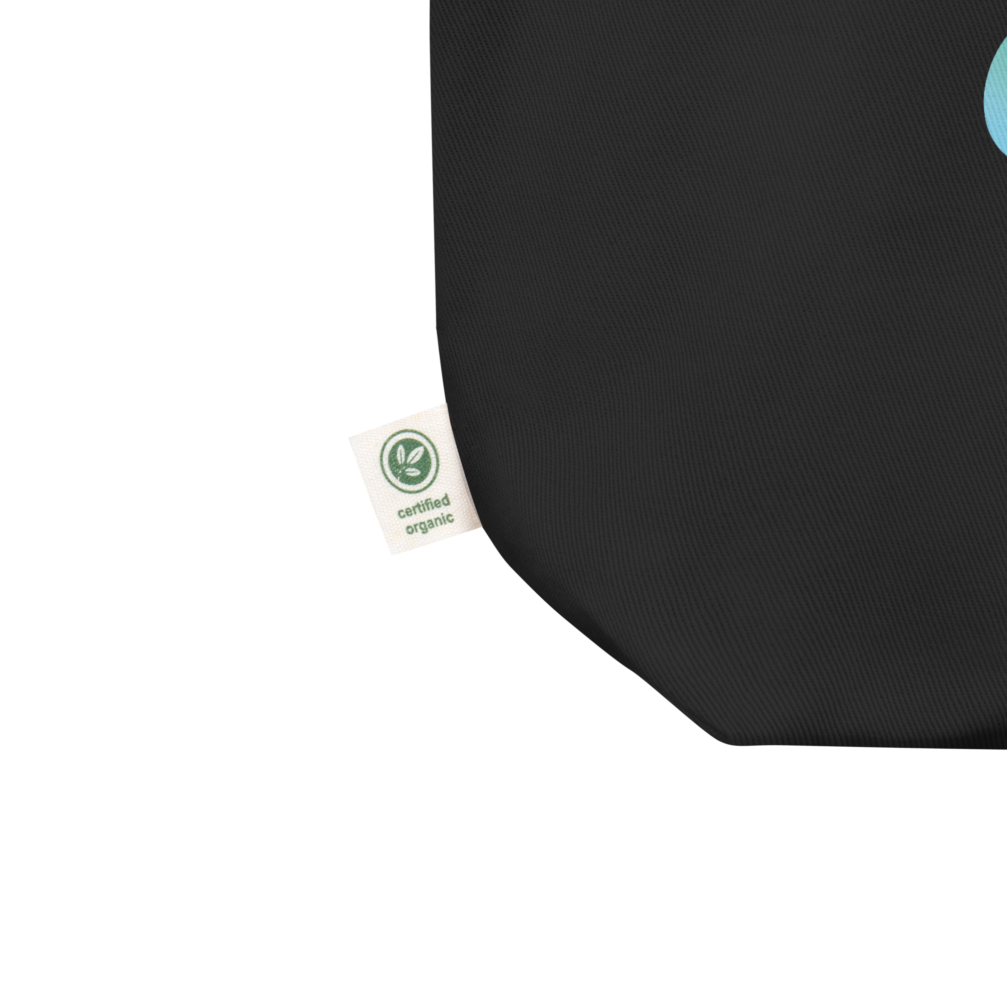 Close up of black tote bag with a 'certified organic' label at the corner.