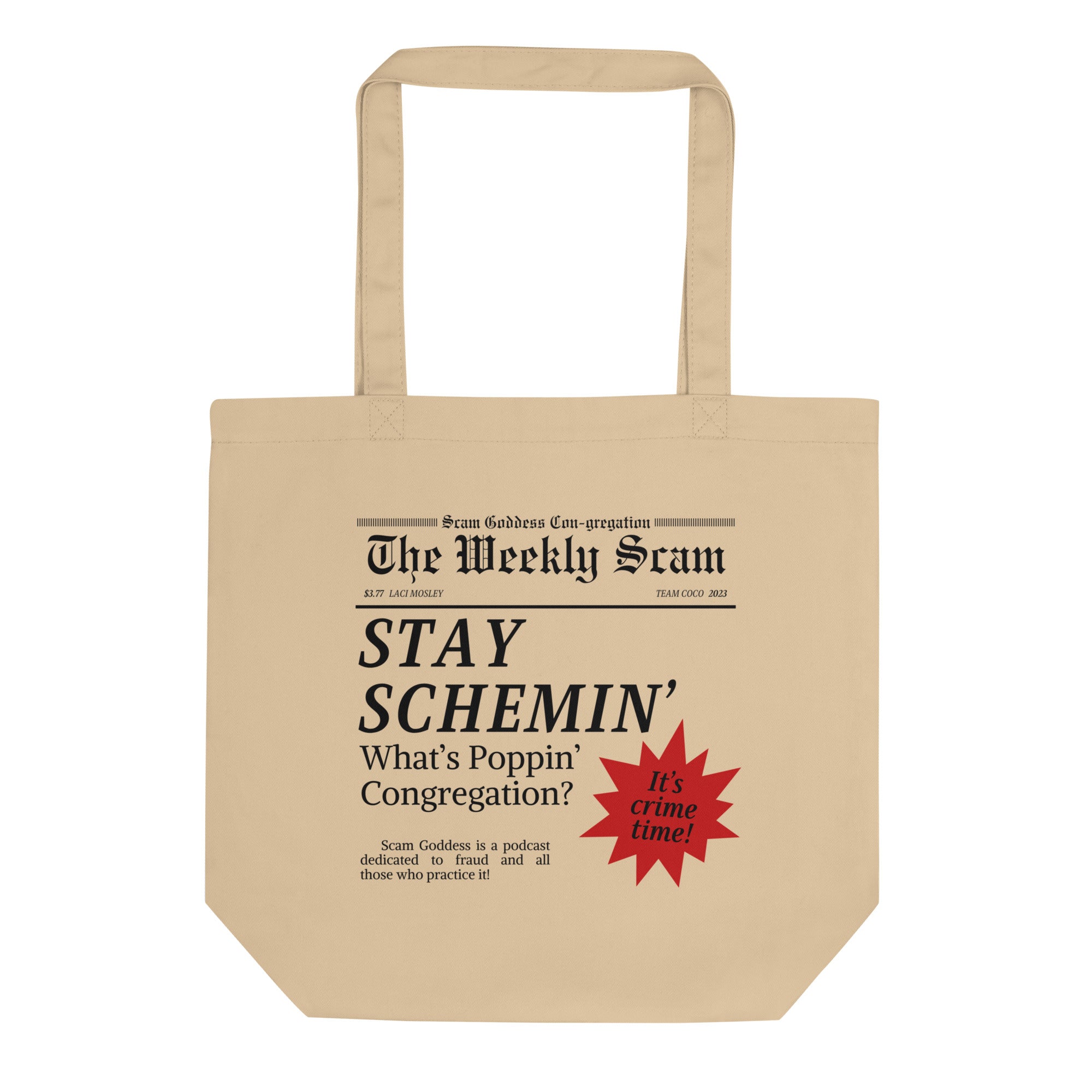 Cream colored tote bag with newspaper-style design featuring the phrase 'STAY SCHEMIN' and 'Scam Goddess' text featuring red sunburst graphic.