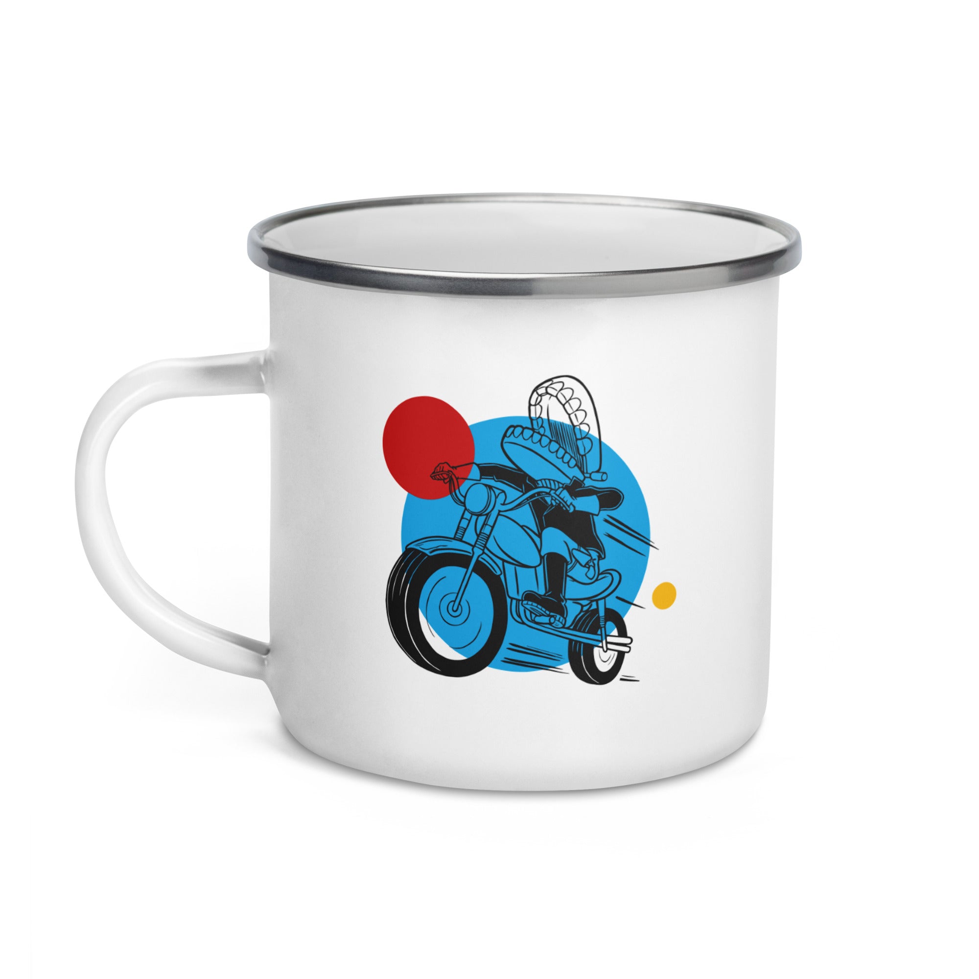 Front side of a white enamel mug featuring a black, red, blue and yellow design of a character riding a motorcycle and handle on the left side.