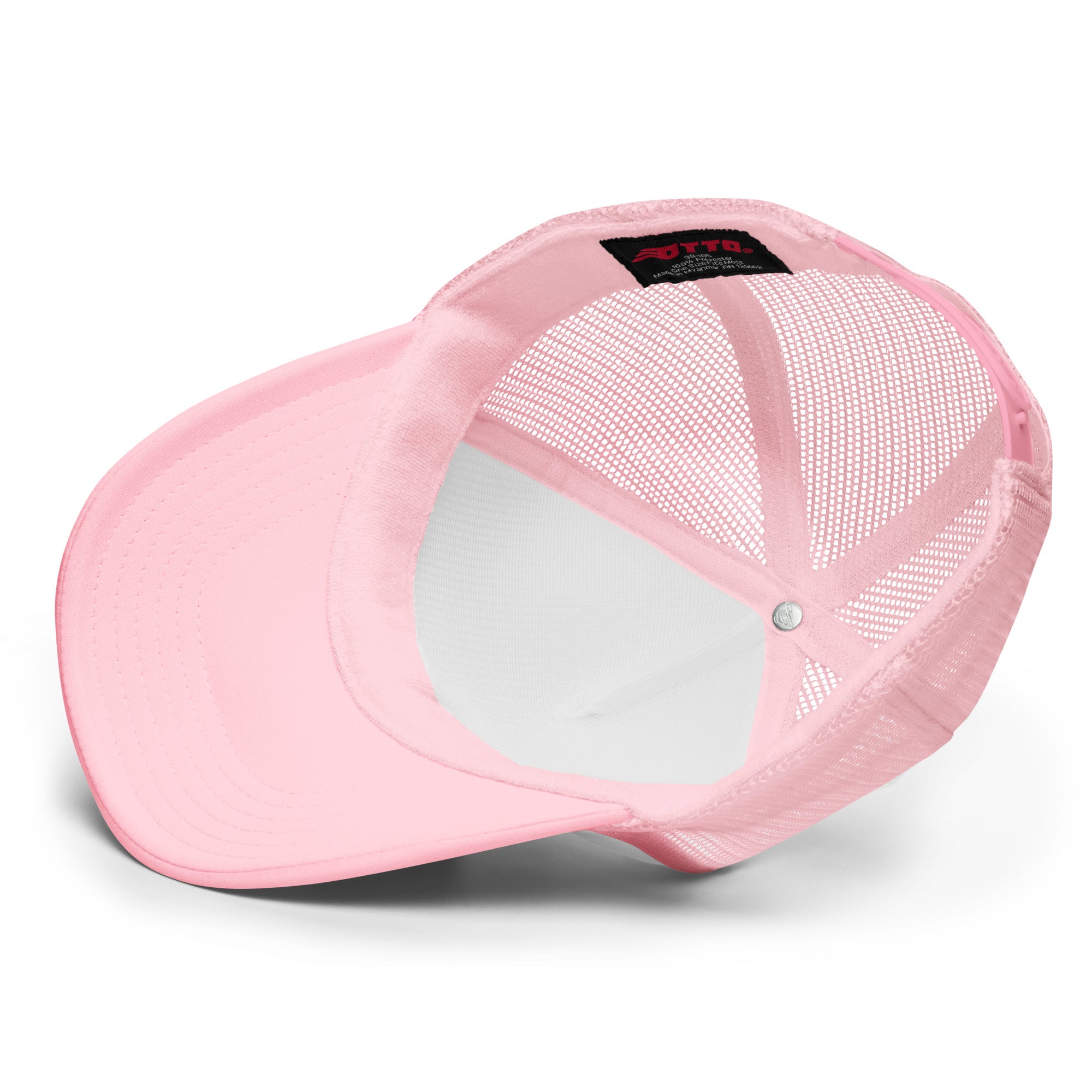 Light pink trucker style baseball cap viewed from below, showcasing a mesh back and interior lining.