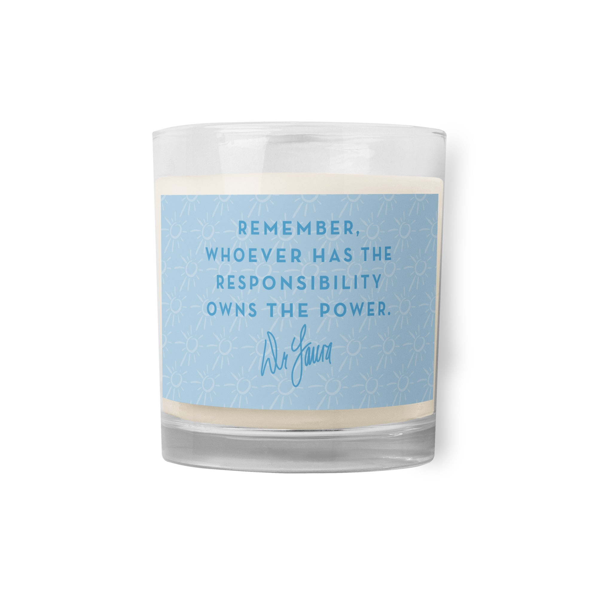 Candle with a blue label featuring the quote: 'Remember, whoever has the responsibility owns the power.' with 'Dr. Laura' signature