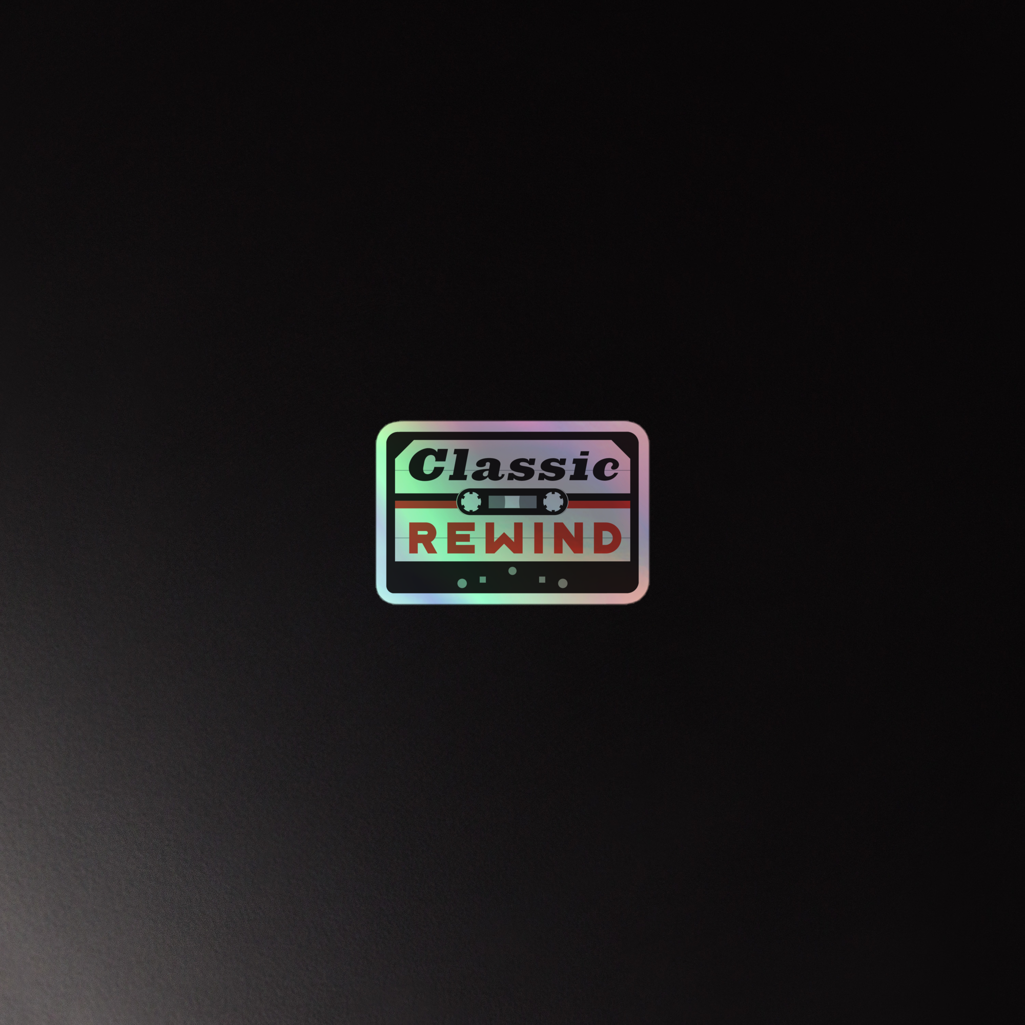 Holographic sticker of 'Classic Rewind' logo with a colorful cassette tape graphic on a dark background.