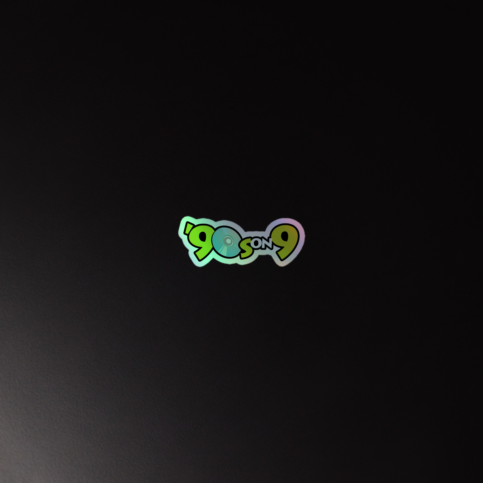 Holographic sticker of the  '90s on 9' logo featuring a colorful design with a CD icon and playful typography on a dark background.