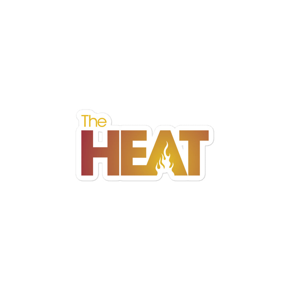 Sticker of the 'The Heat' logo in warm, golden gradiant colors and flame motif.