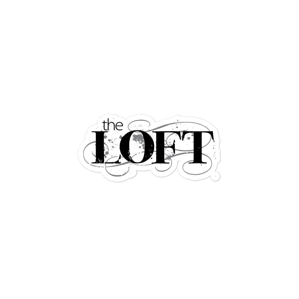 Sticker of the black and grey 'the LOFT' logo featuring scripty typography with a textured background.