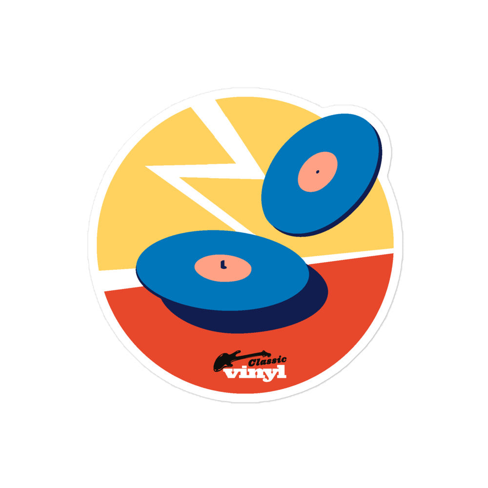 Circular sticker with a colorful design featuring two blue vinyl records on a red and yellow background with a white zigzag lightning shape. The bottom includes the 'Classic vinyl' logo with a black guitar silhouette and red text.