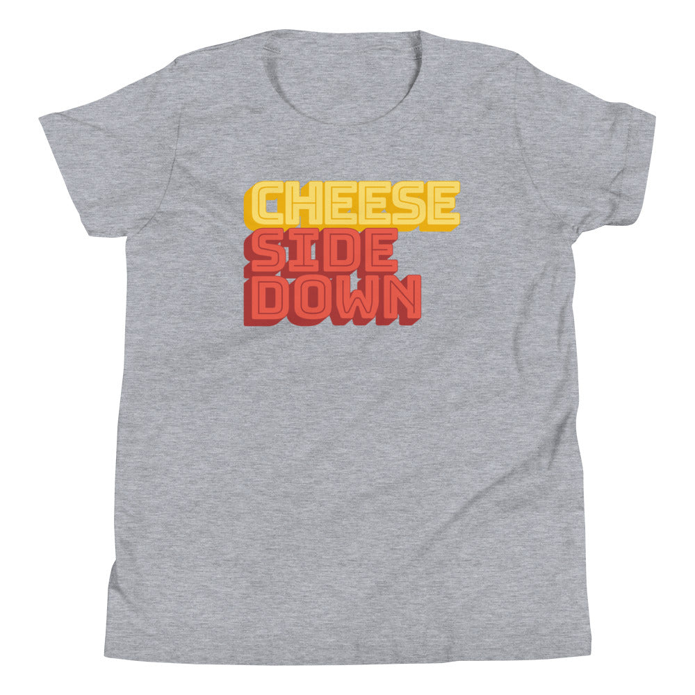 Light gray t-shirt with with yellow and red text reading 'CHEESE SIDE DOWN' in a bold font.