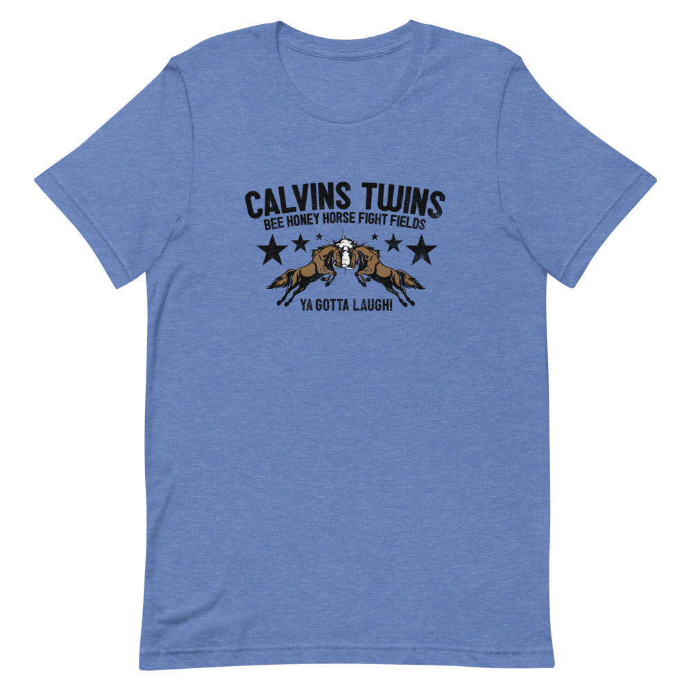 Blue t-shirt with 'Calvins Twins,' horse graphics, and the phrase 'Ya Gotta Laugh!' featuring stars and a playful design, laying flat.