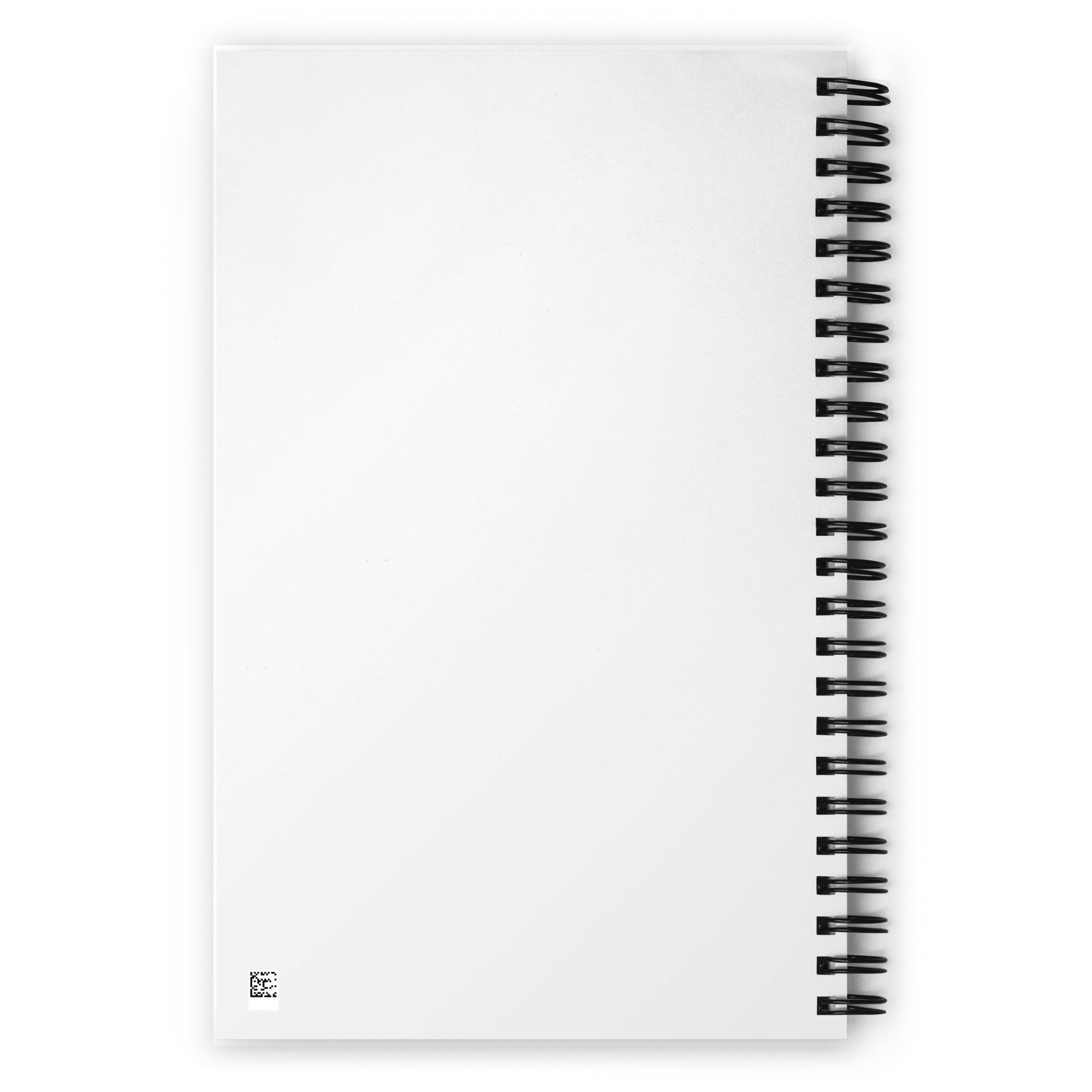 Back cover of a white spiral notebook resting on white surface, the black wire binding is visible on the right.