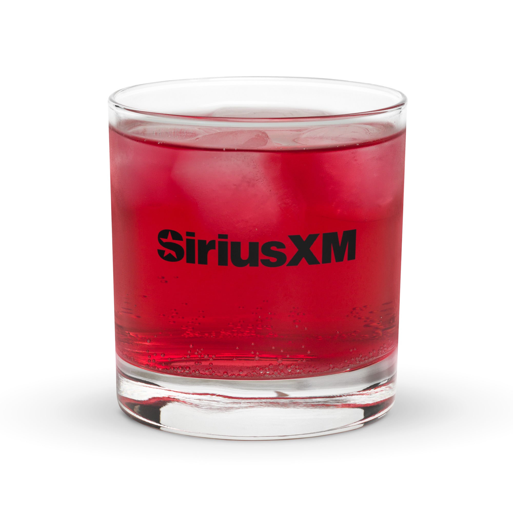 Clear rocks glass filled with a red beverage and ice cubes, featuring a bold black ‘SiriusXM’ logo centered on the front.