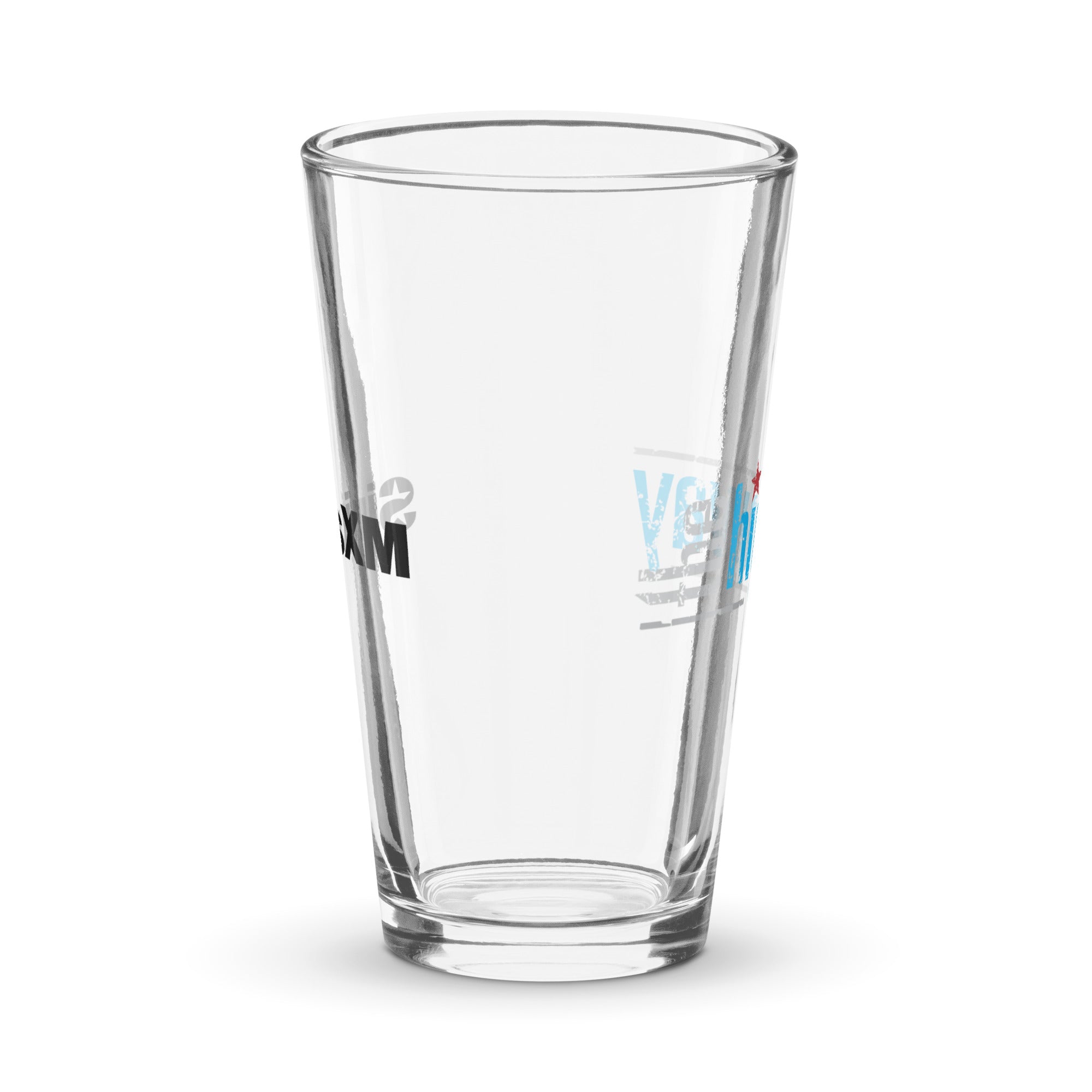 Side view of clear pint glass featuring partially visible front and back designs.