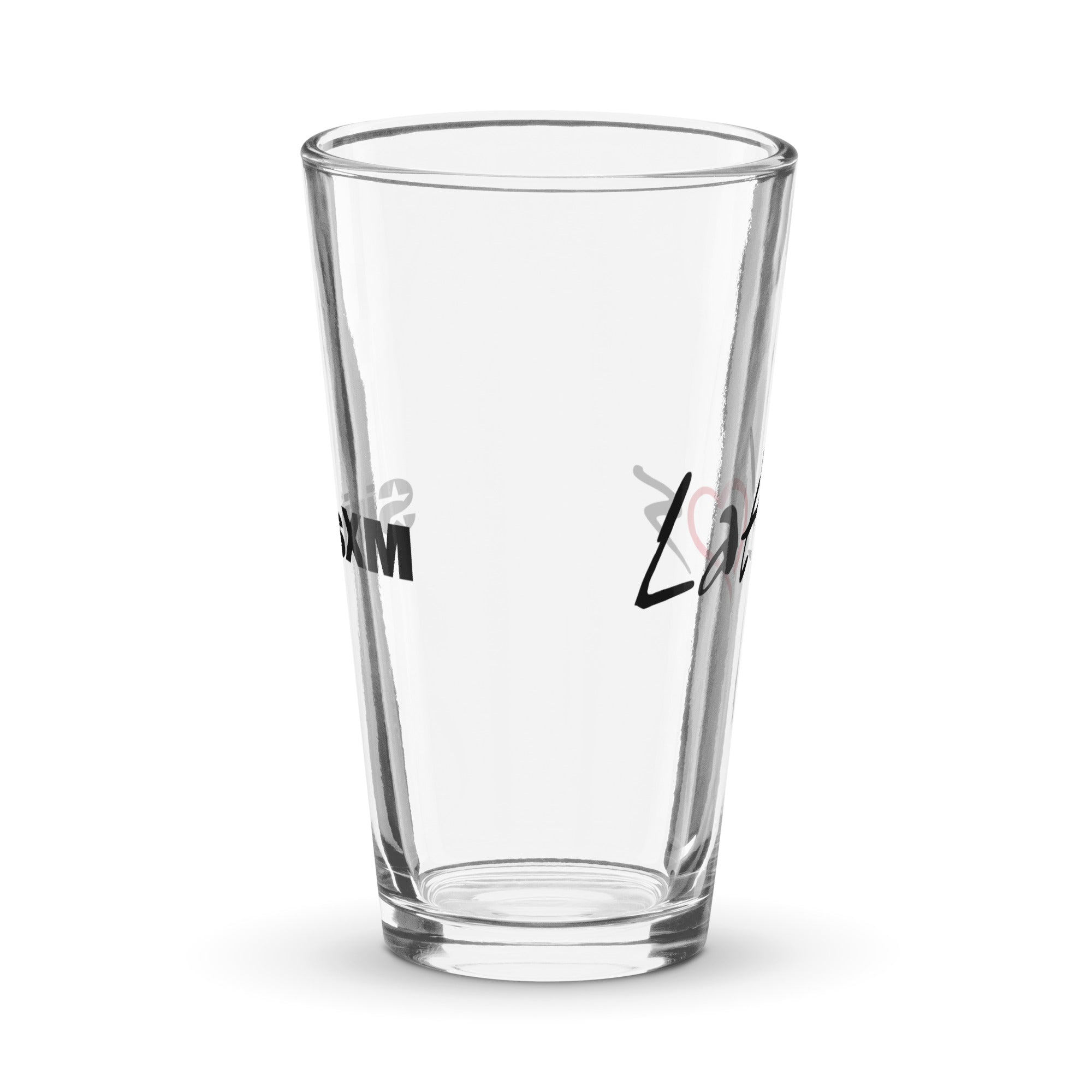 Side view of clear pint glass featuring partially visible front and back designs.