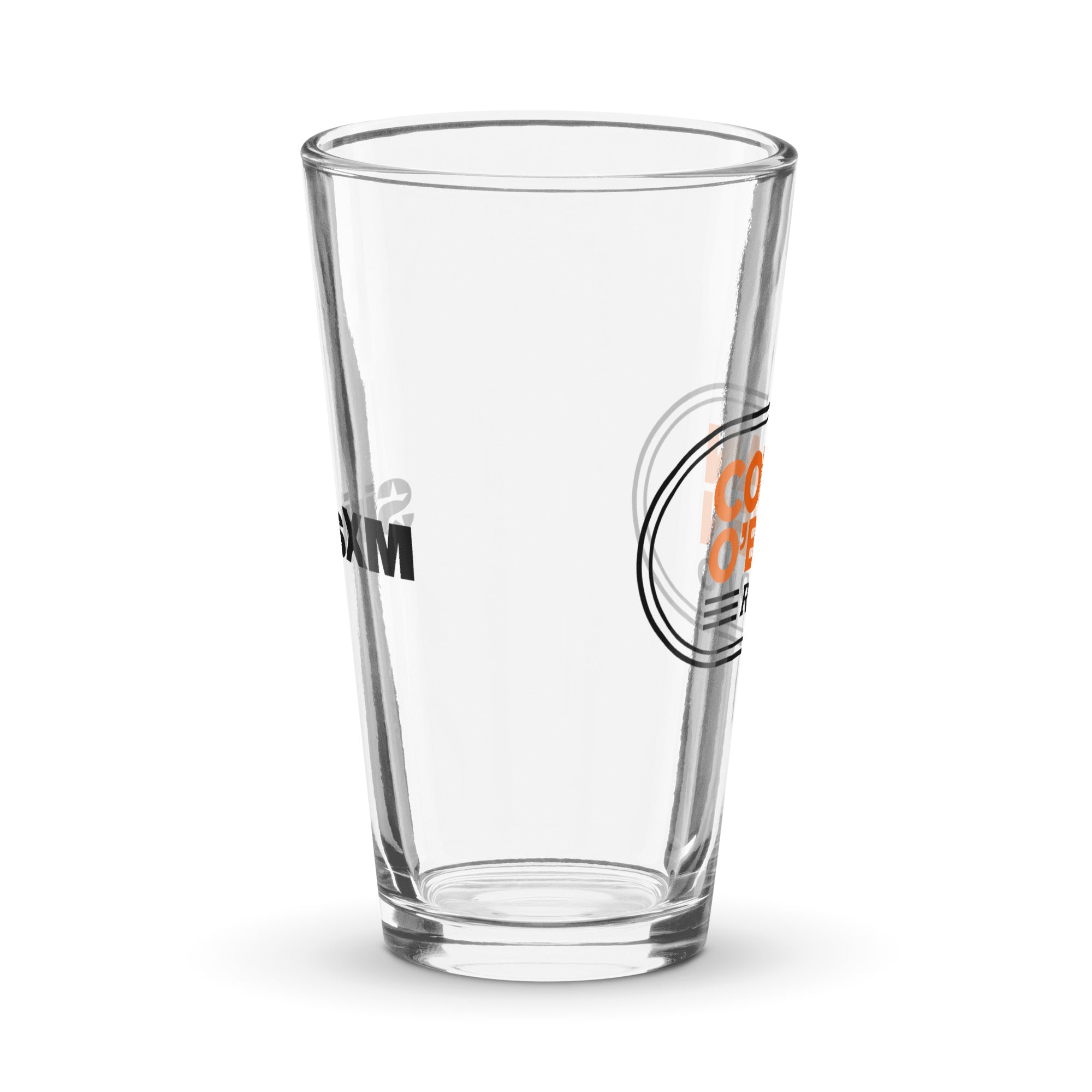 Side view of clear pint glass featuring partially visible front and back designs.