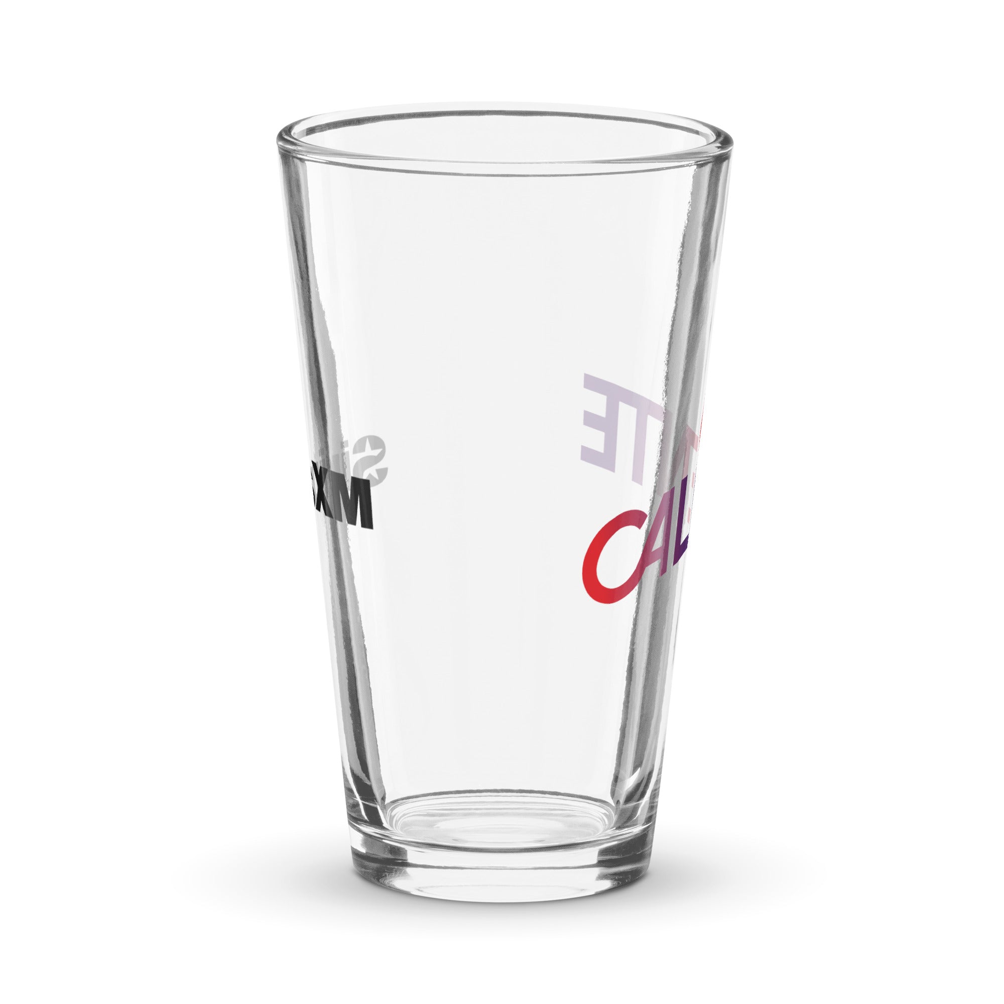 Side view of clear pint glass featuring partially visible front and back designs.
