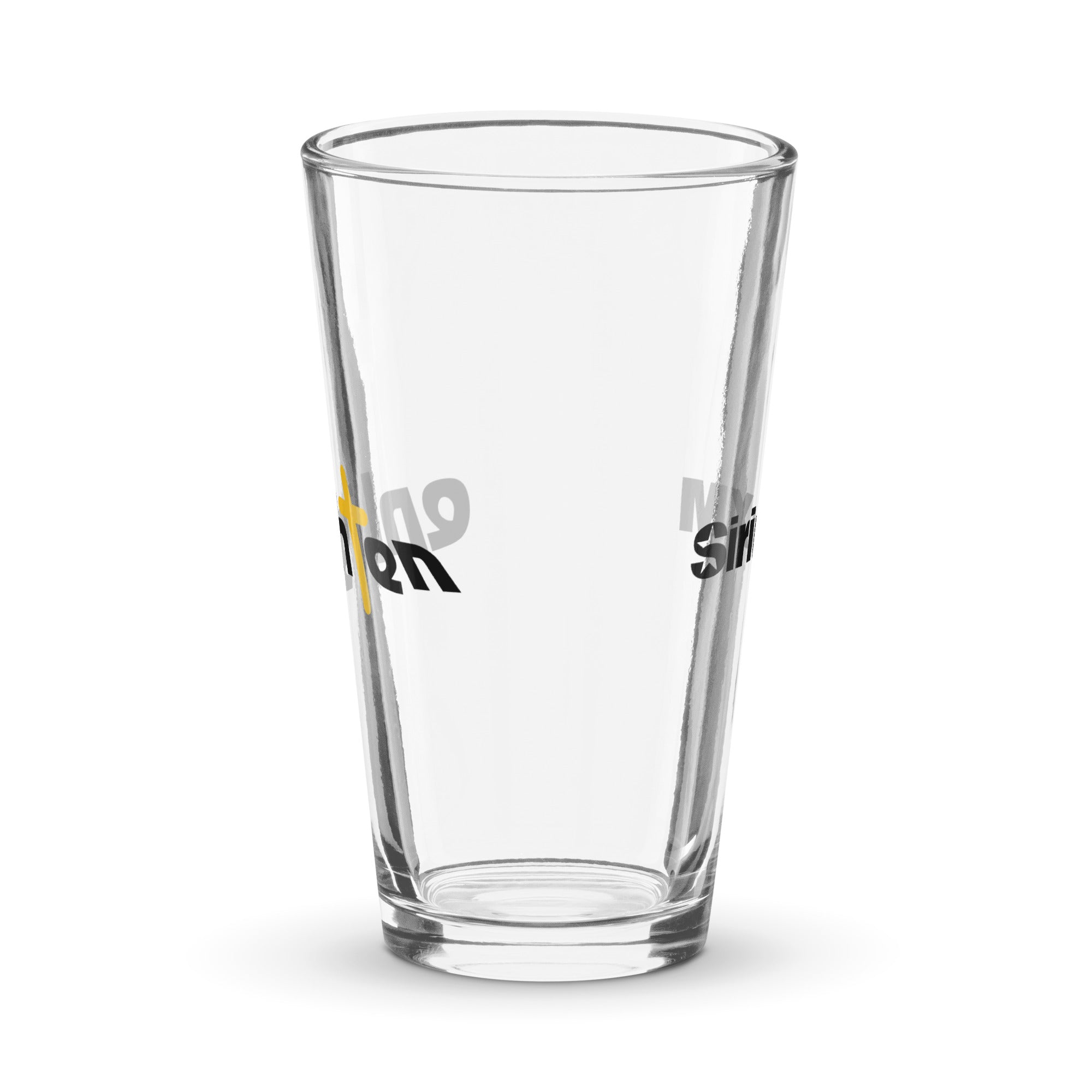 Side view of clear pint glass featuring partially visible front and back designs.