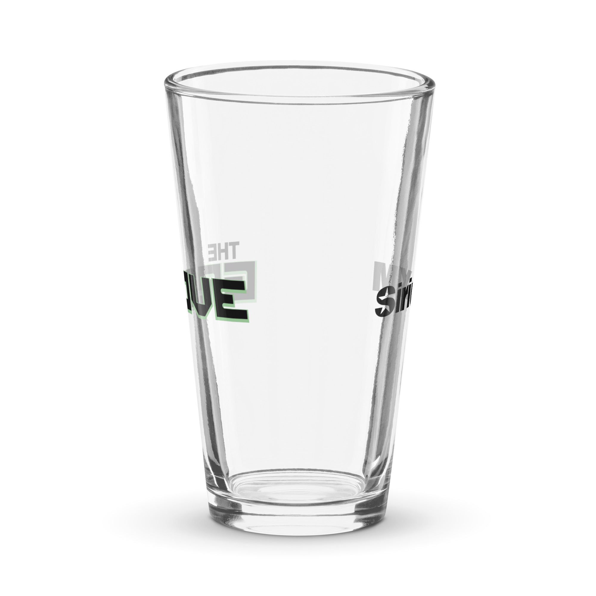 Side view of clear pint glass featuring partially visible front and back designs.