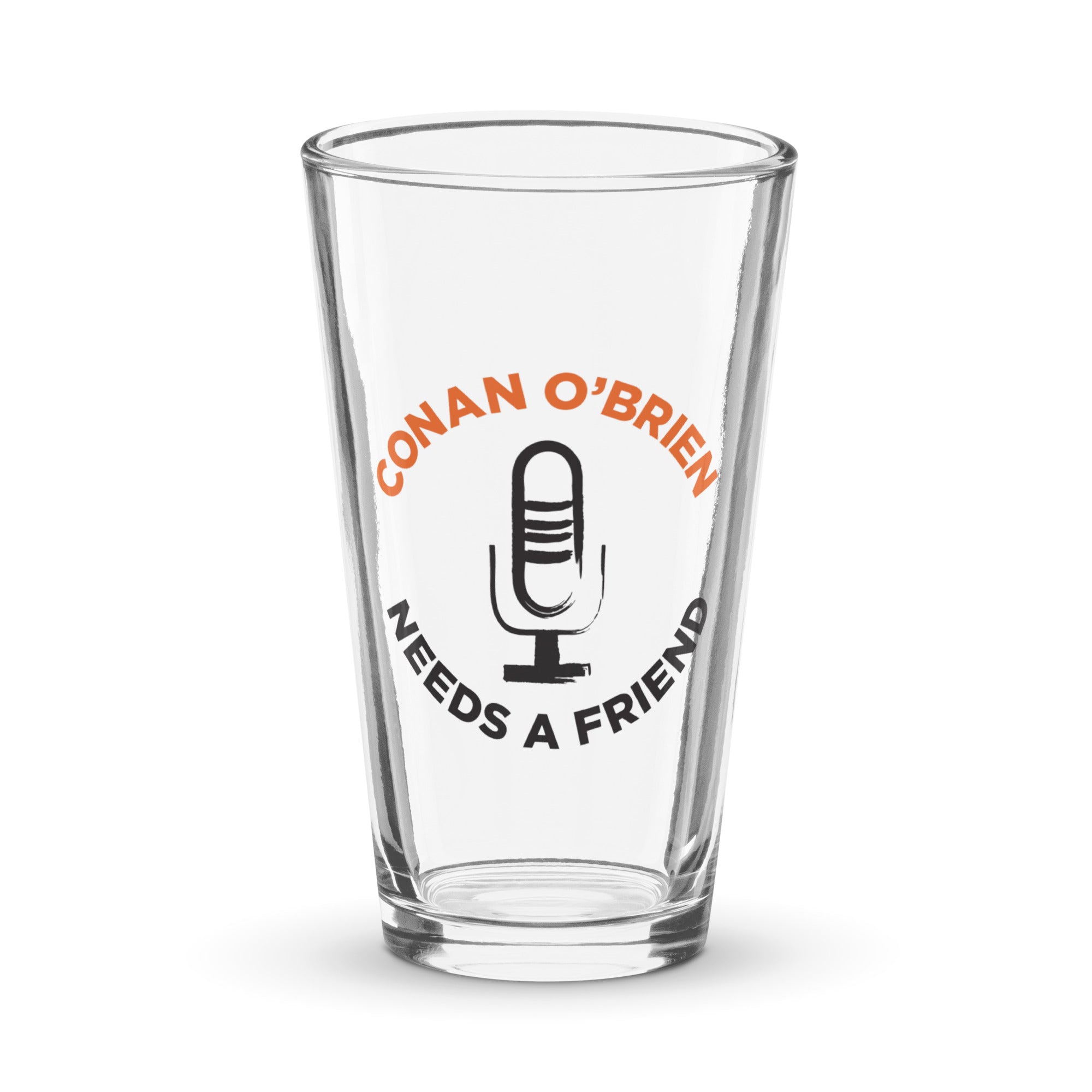 Clear pint glass featuring the text 'Conan O'Brien Needs a Friend' with a microphone graphic.