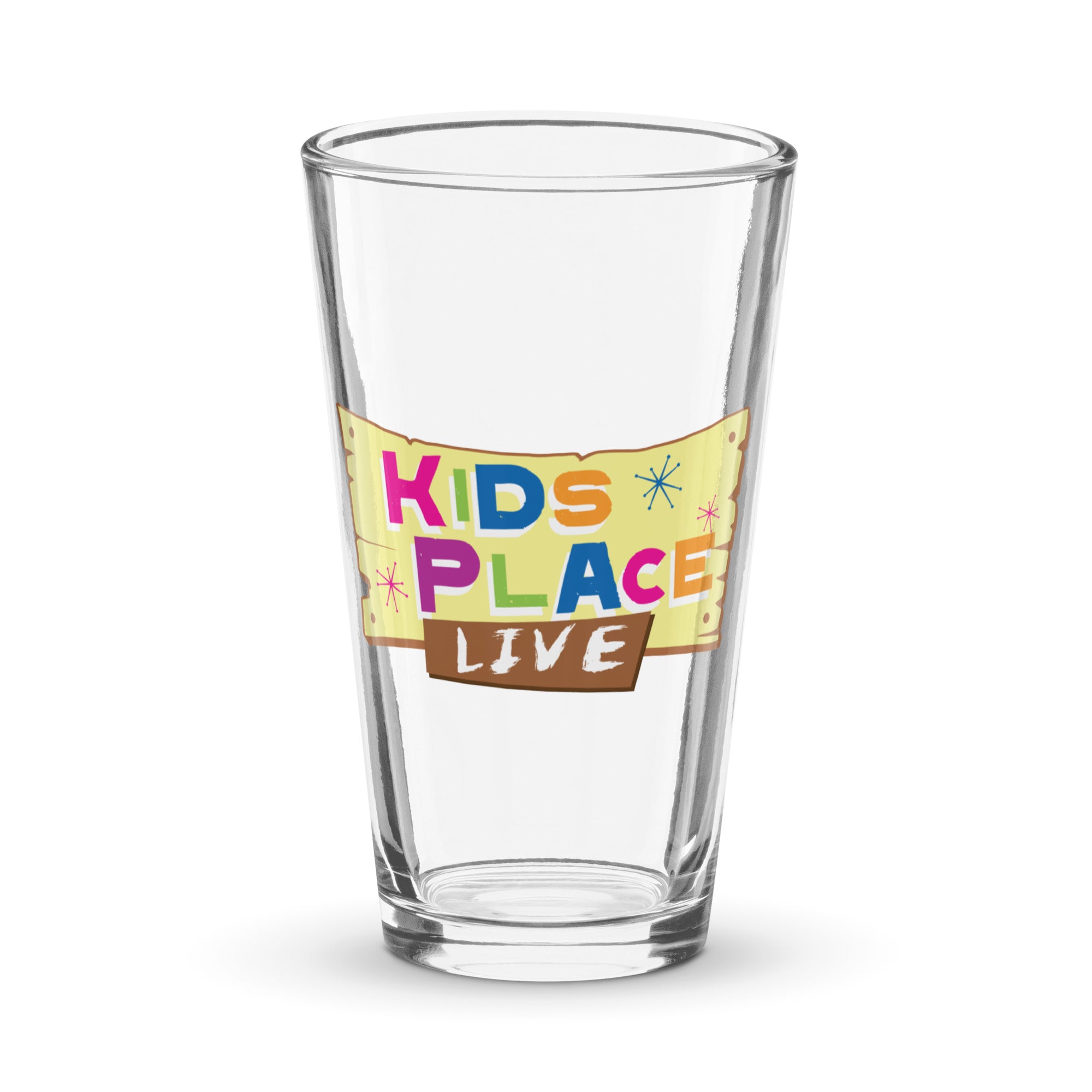 Clear pint glass with colorful 'KIDS PLACE LIVE' design on a yellow banner.