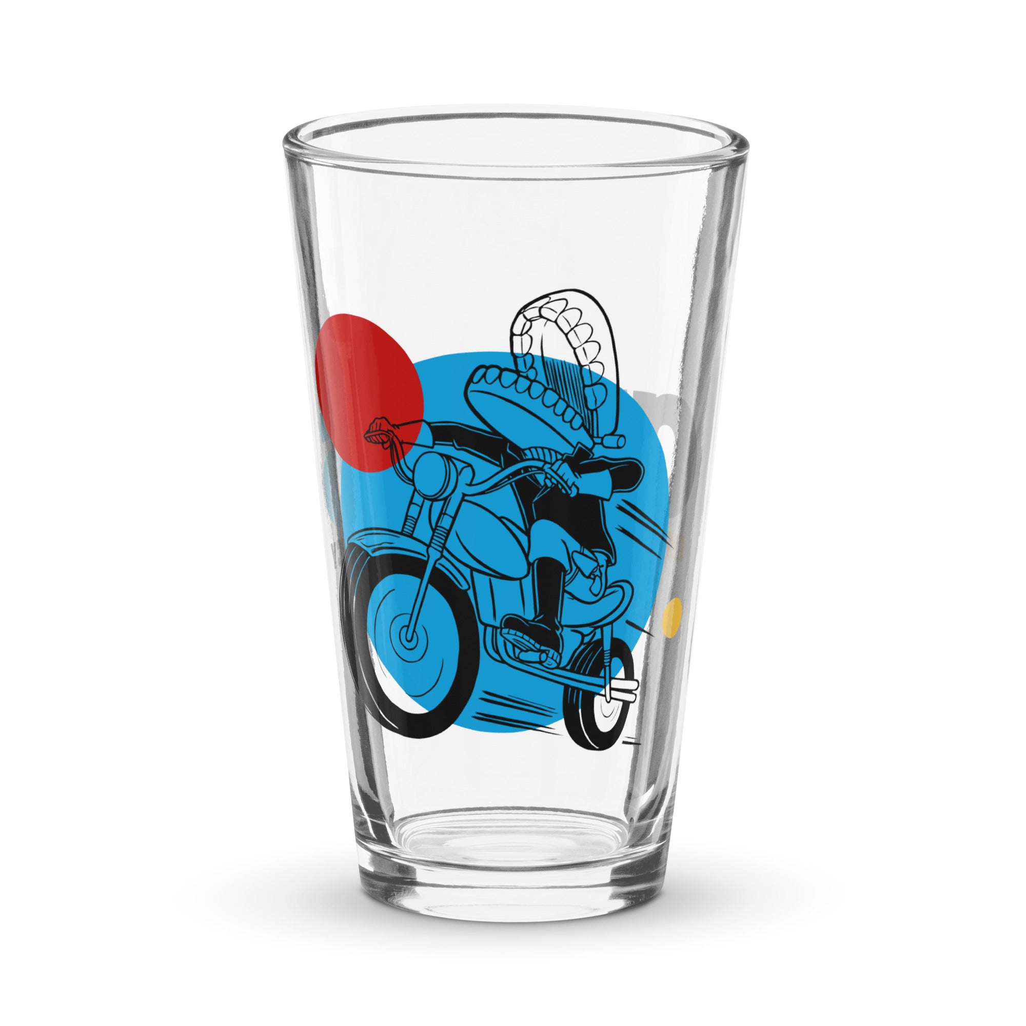 A pint glass featuring a blue, black and red illustration of the Motor Mouth character riding a motorcycle.