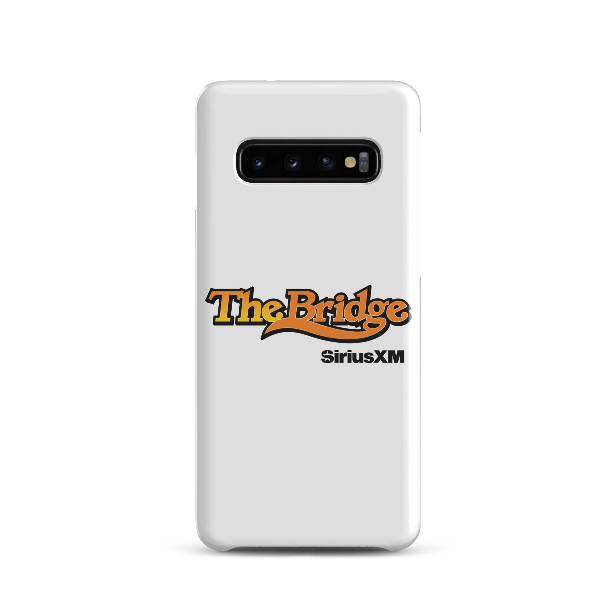 A white phone case featuring the logo 'The Bridge' in an orange gradient and black outline, and  'SiriusXM' in black.