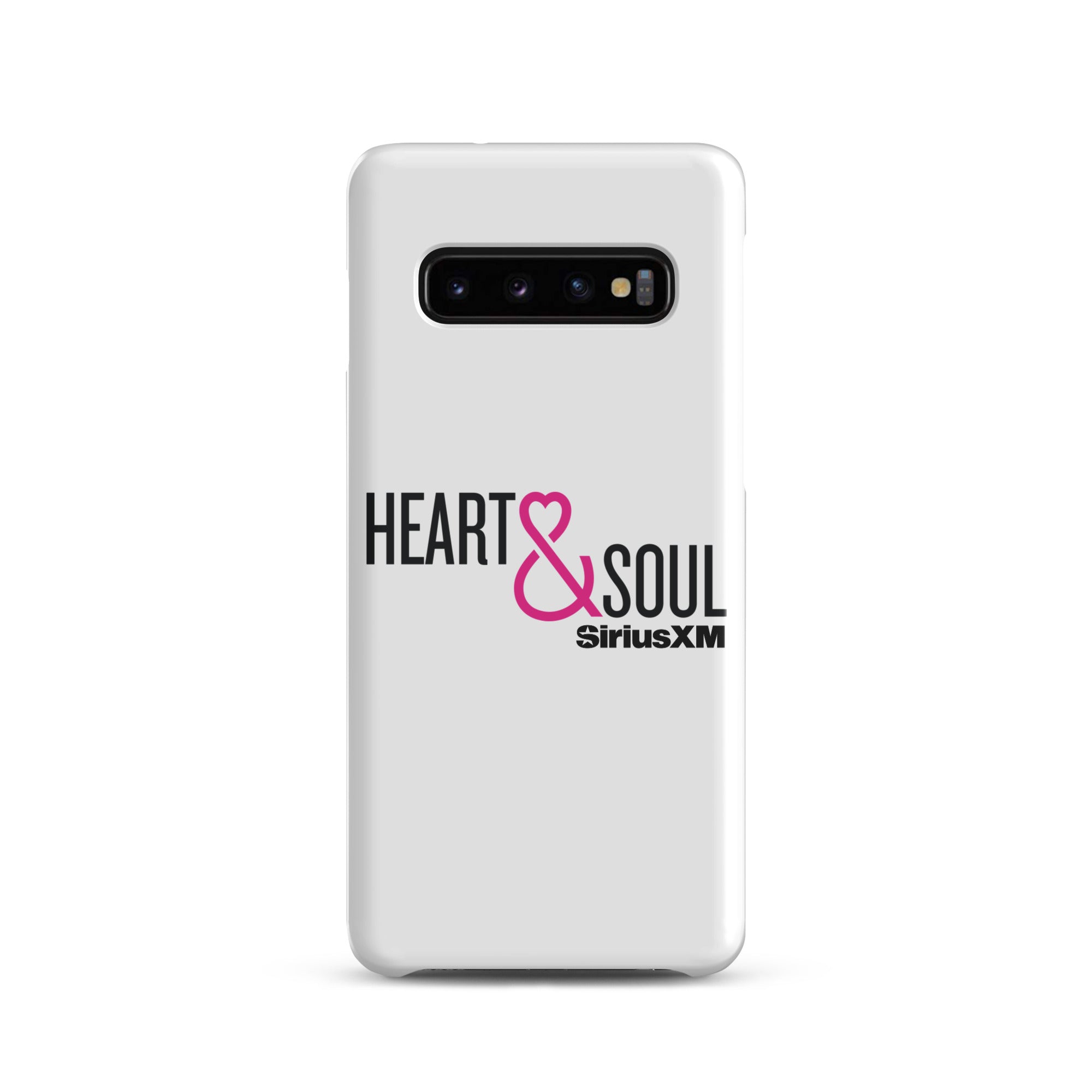 White phone case featuring 'HEART & SOUL' in black and pink text, with 'SiriusXM' logo.