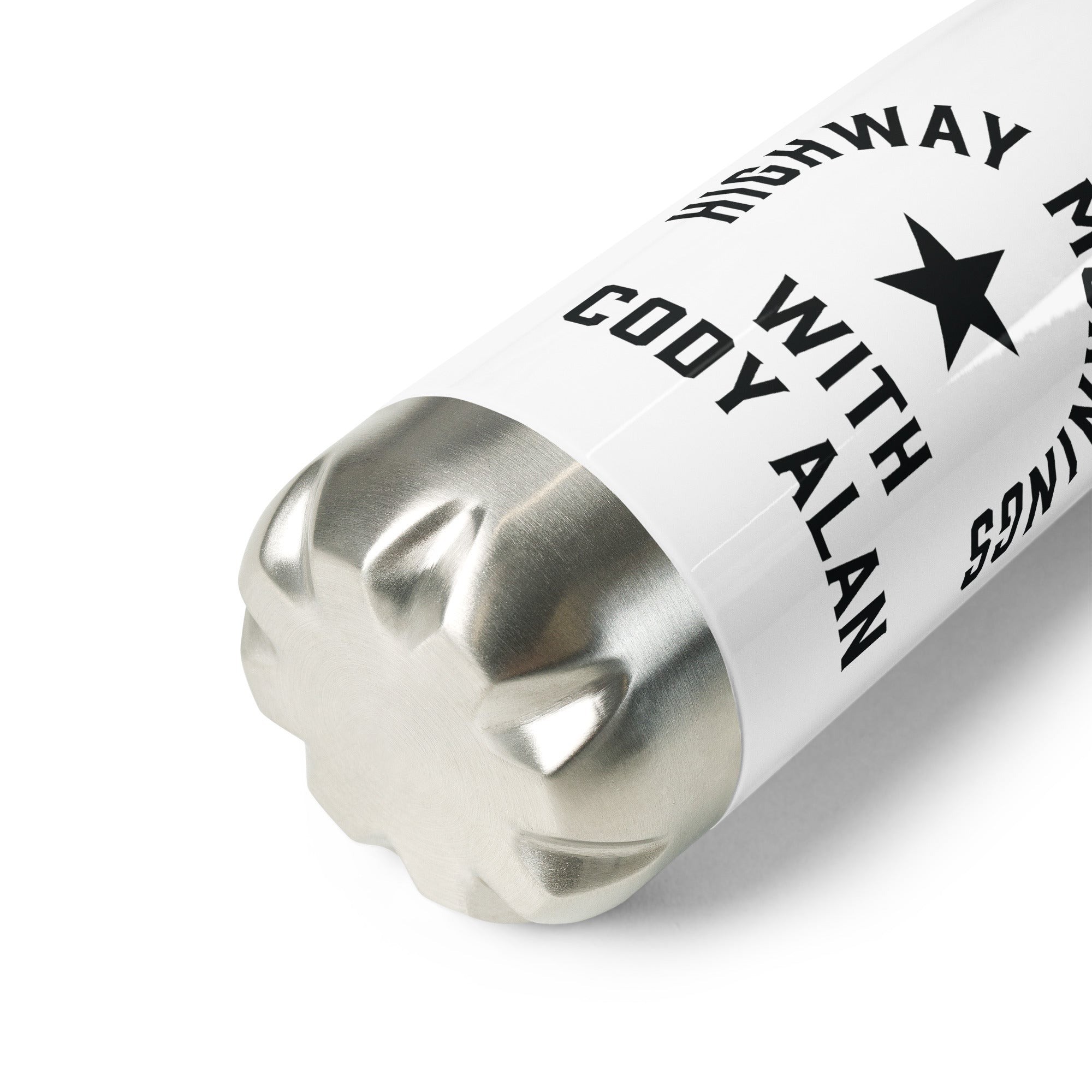 A close-up of the base of a white stainless steel water bottle, showing part of the 'HIGHWAY MORNINGS WITH CODY ALAN' text and the silver metal bottom.