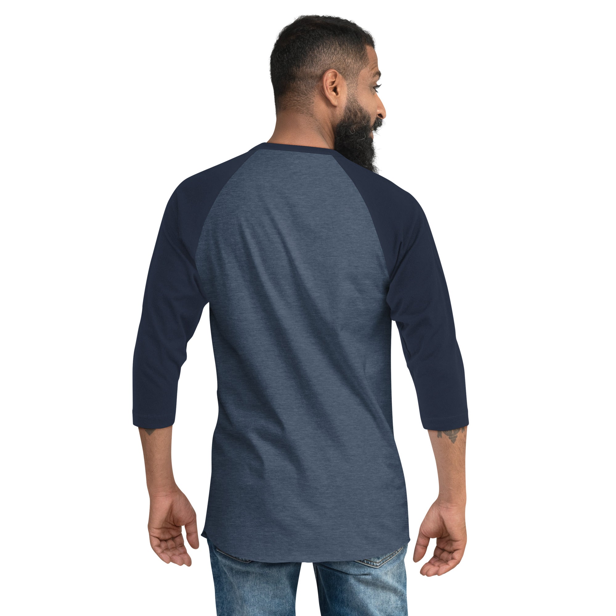 A man facing away from the camera wearing a heather denim and navy 3/4-sleeve raglan shirt. The back is plain with no printed design.
