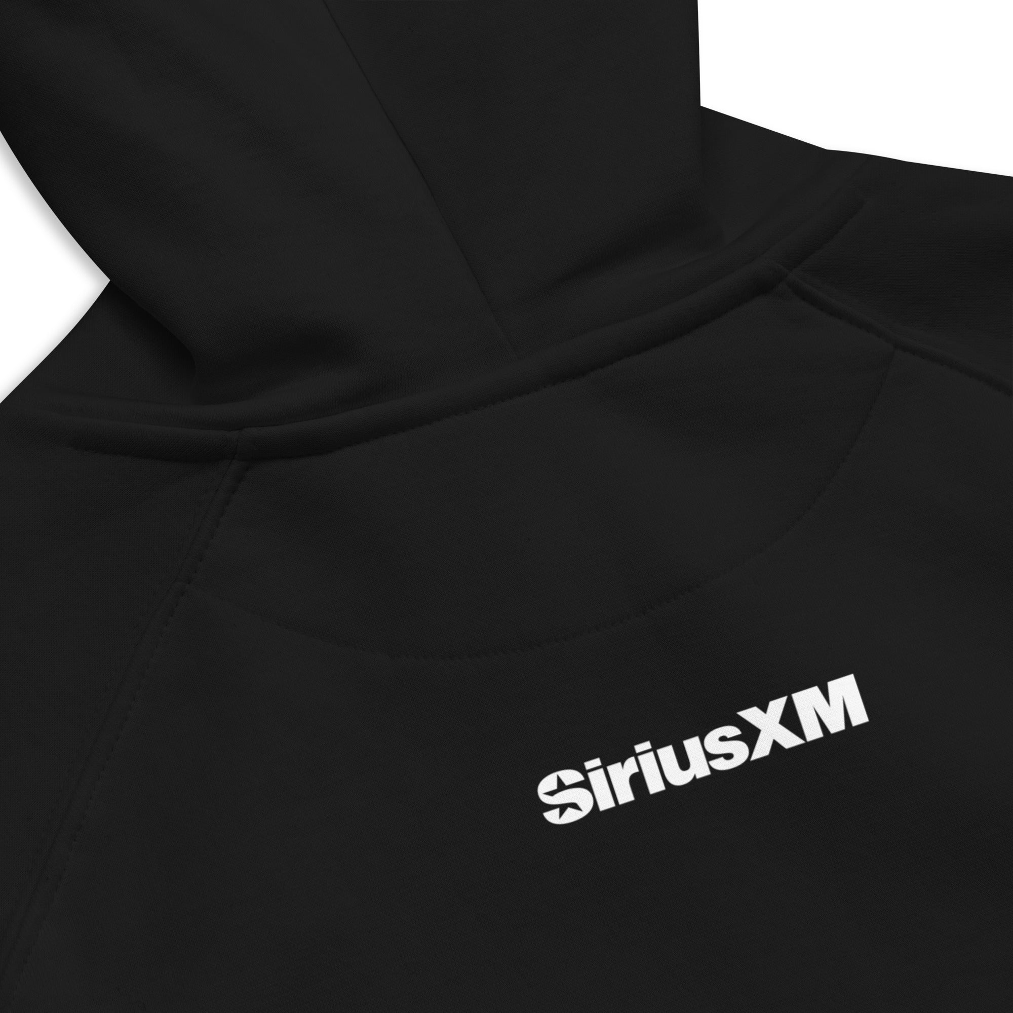 Close-up of the back of a black hoodie showing the white 'SiriusXM' logo printed just below the hood, with visible raglan seam stitching.