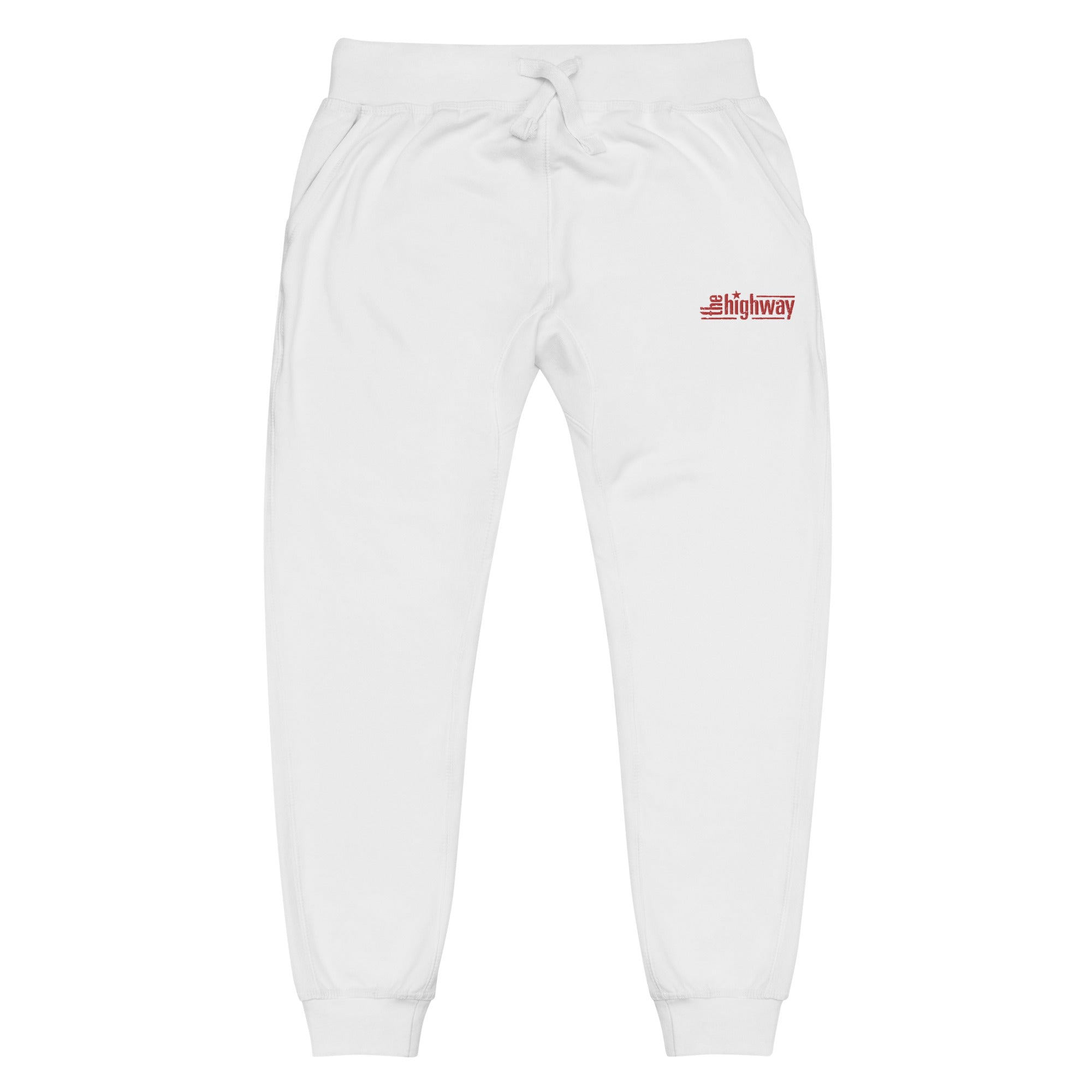 White sweatpants with a red logo that reads 'the highway' printed on the left thigh.