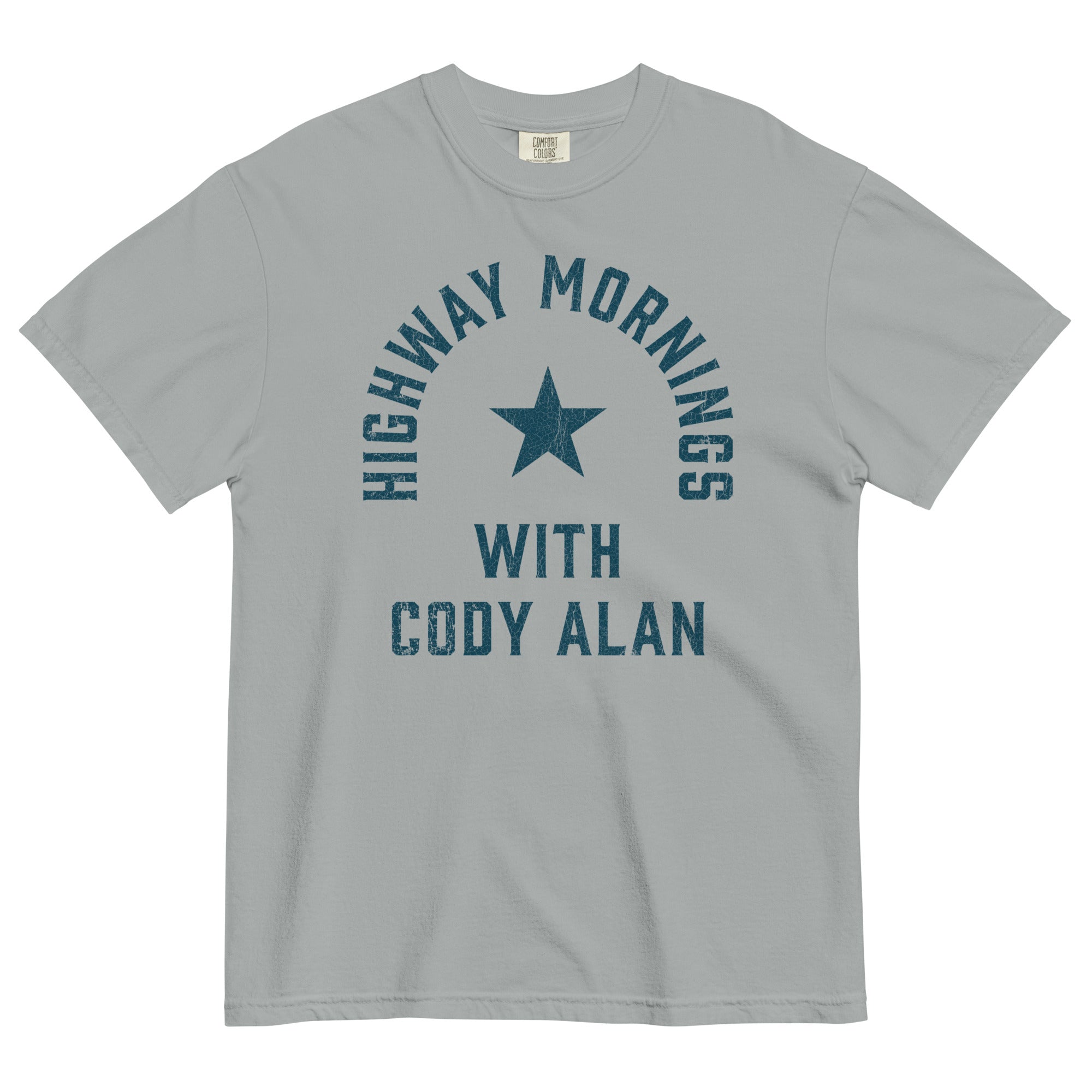 Gray short-sleeve t-shirt with distressed blue text reading 'HIGHWAY MORNINGS WITH CODY ALAN' arranged around a blue star in the center of the chest.