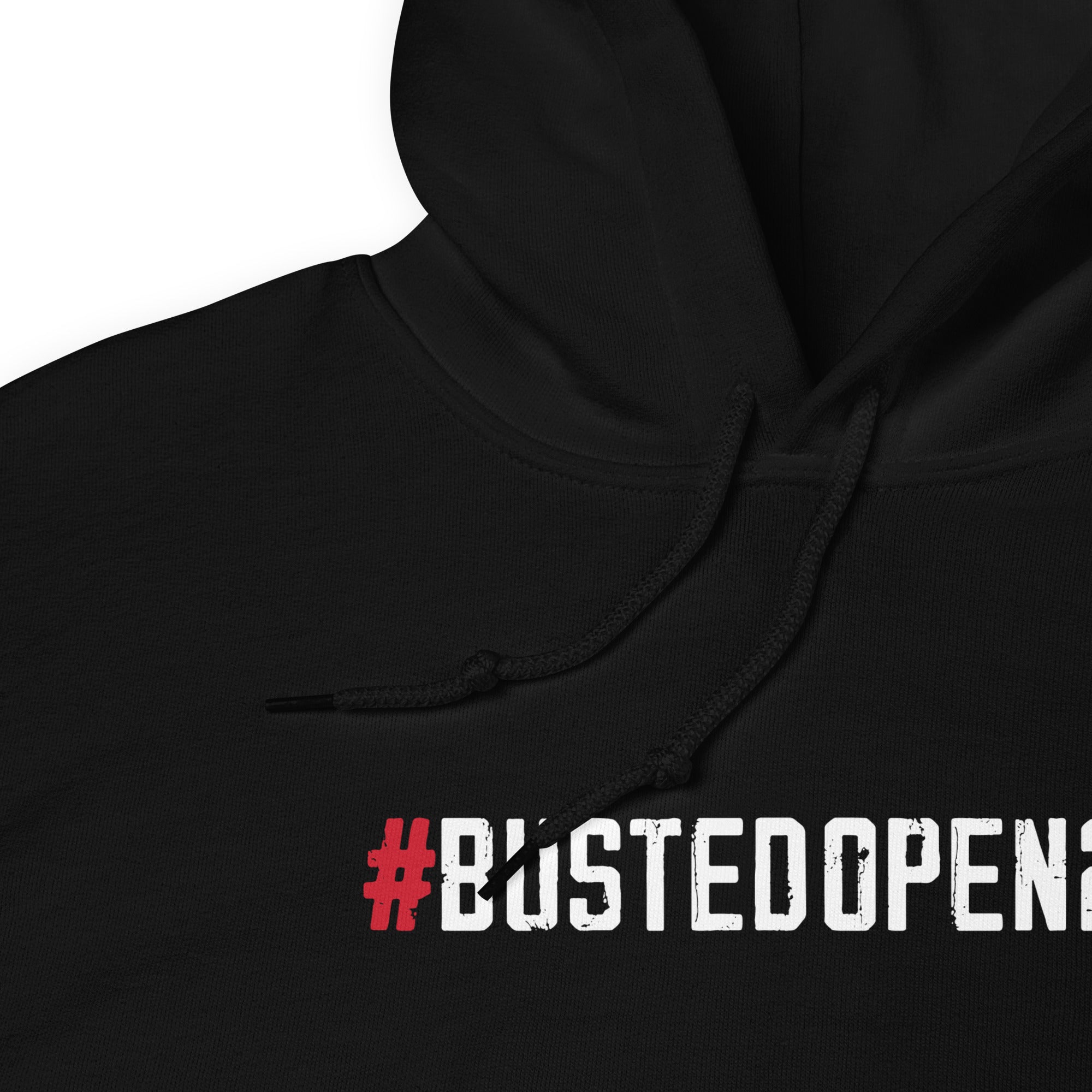 Close up of black hoodie featuring the hashtag style text '#BUSTEDOPEN247' on the front.