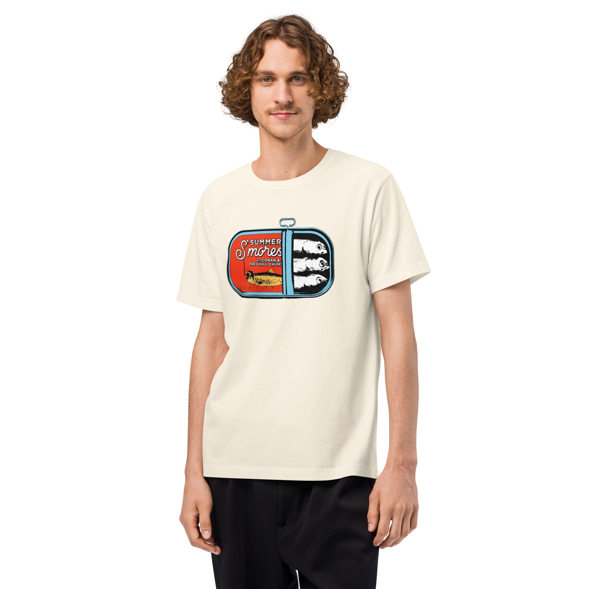 Man wearing a vintage white unisex t-shirt featuring the 'Summer S’mores with Conan & the Chill Chums' sardine can artwork centered on the front.