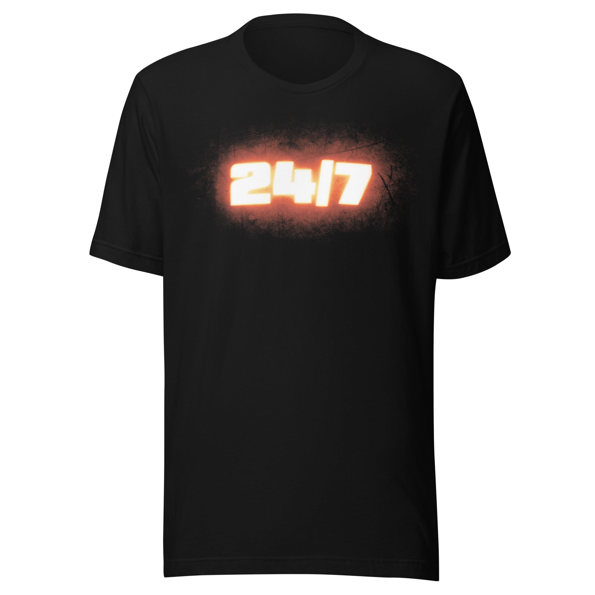 Flat lay of a black t-shirt showing the centered glowing ‘24/7’ graphic on the front, with bright white numbers and an orange aura over a distressed black background.