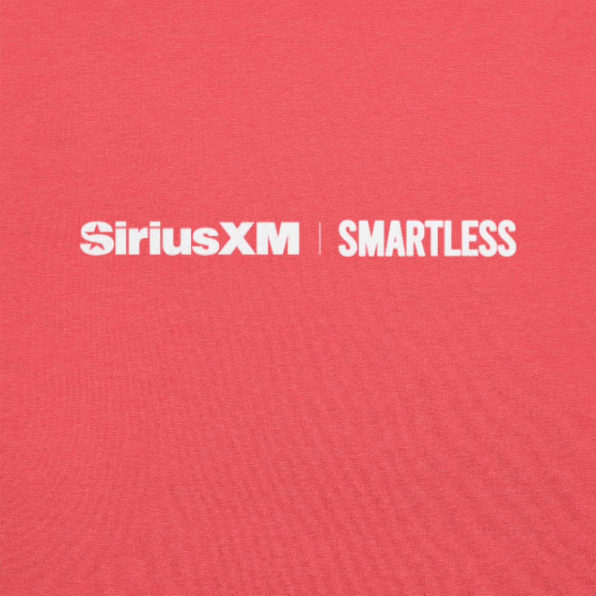 A close-up of the back neckline of a red T-shirt, showing the 'SiriusXM' and 'SMARTLESS' logos printed in white.