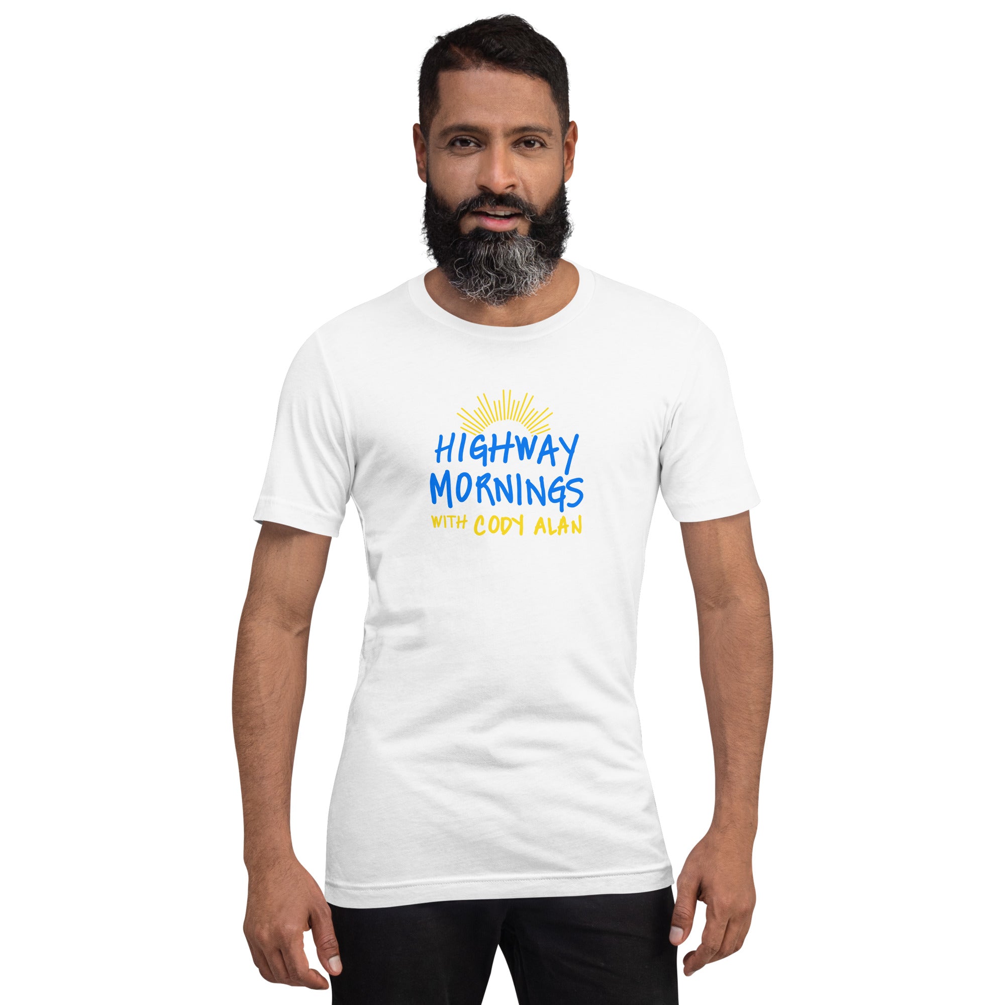 A man standing and facing forward, wearing a white t-shirt with the design 'HIGHWAY MORNINGS WITH CODY ALAN' printed in blue and yellow beneath a yellow sunburst.