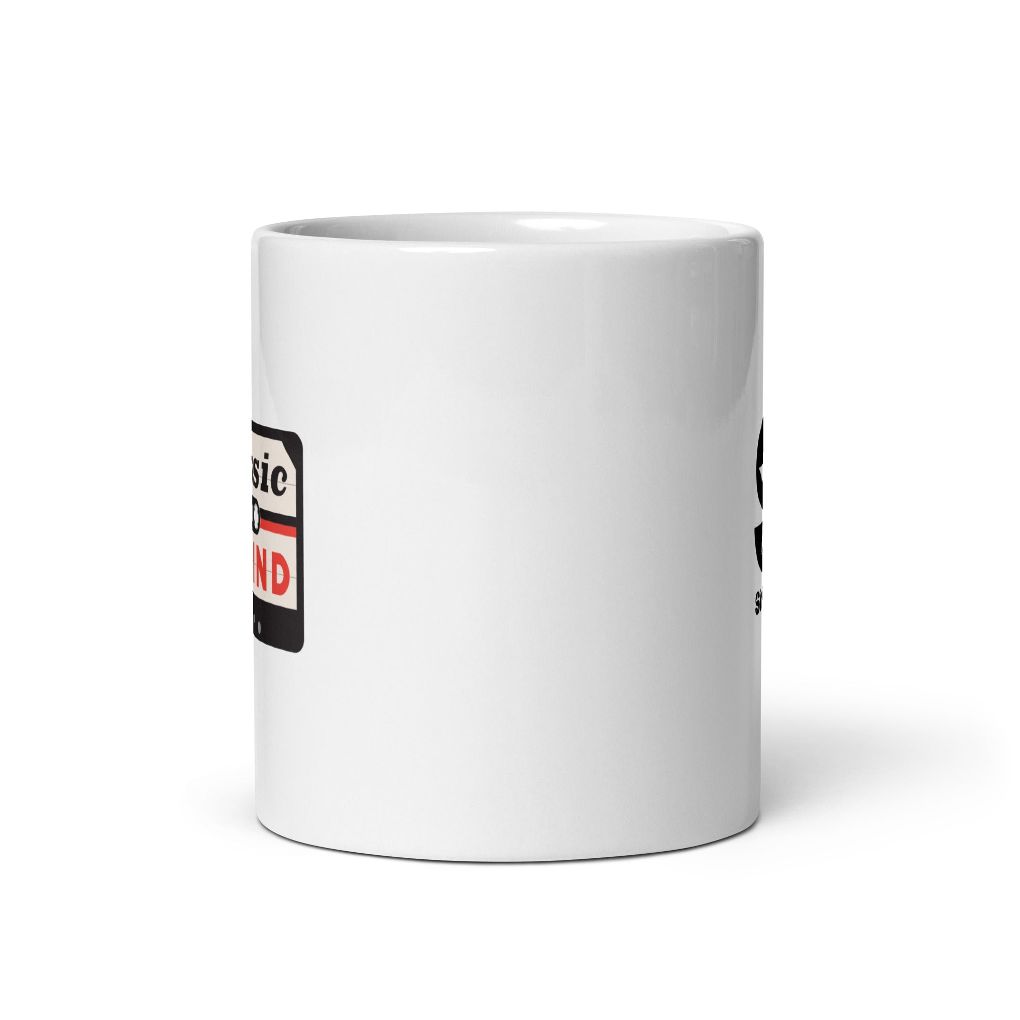 White ceramic mug. View opposite of handle.