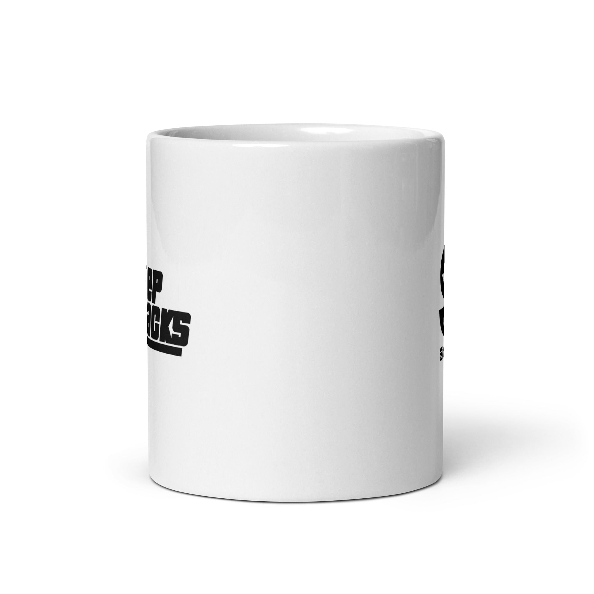 Side view of white ceramic mug, with partially visible front and back logos.