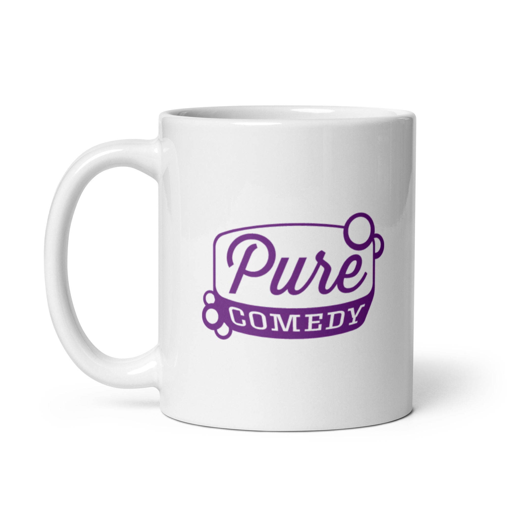 White mug featuring the text 'Pure Comedy' in purple with decorative bubbles.