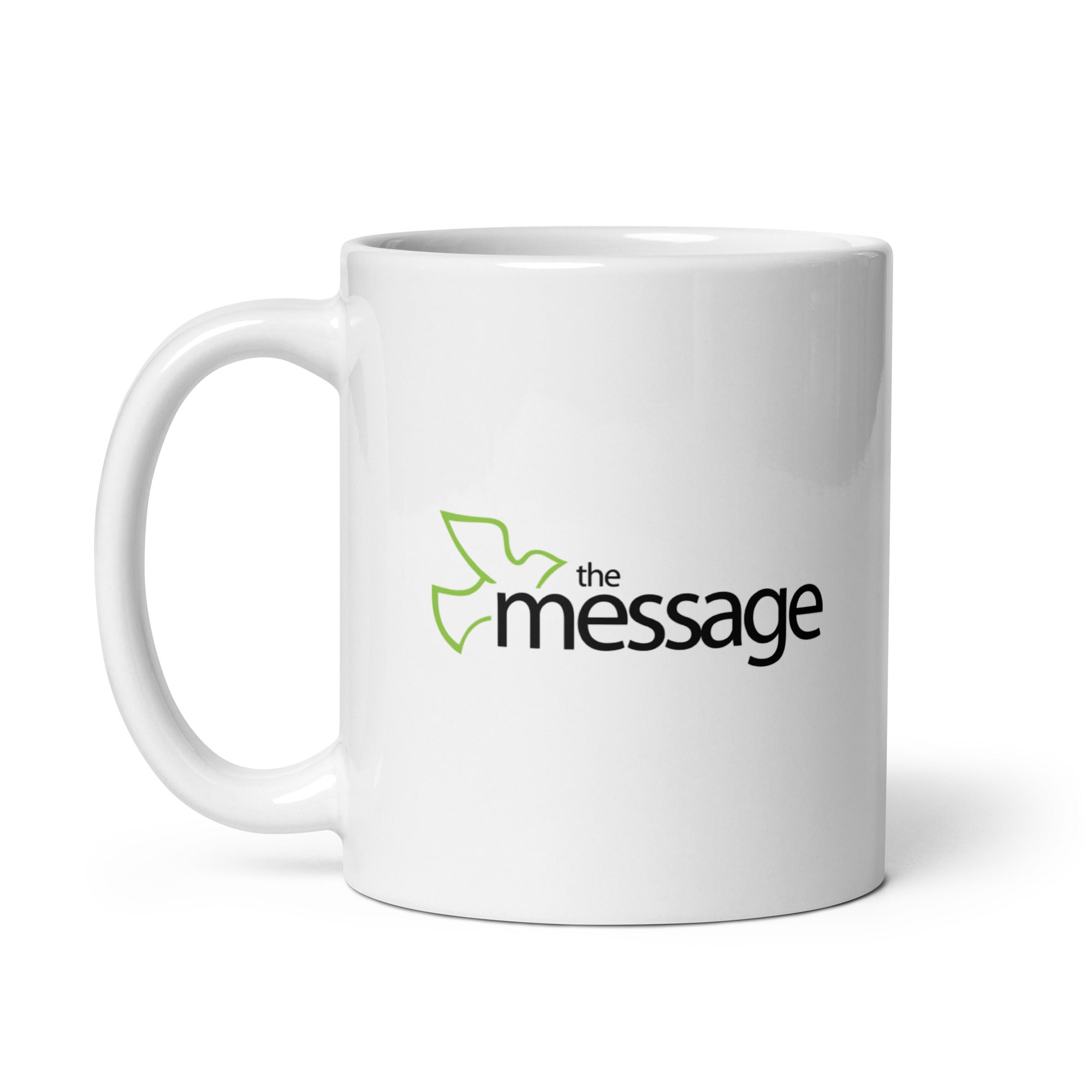 White mug featuring the text 'the message' in black with a green bird design.