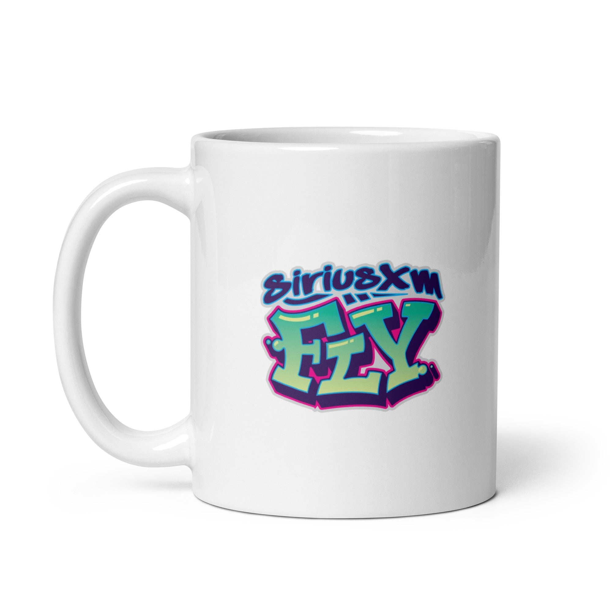 A white mug featuring the 'SiriusXM Fly' logo in vibrant graffiti style; colors include blue, green, and pink.