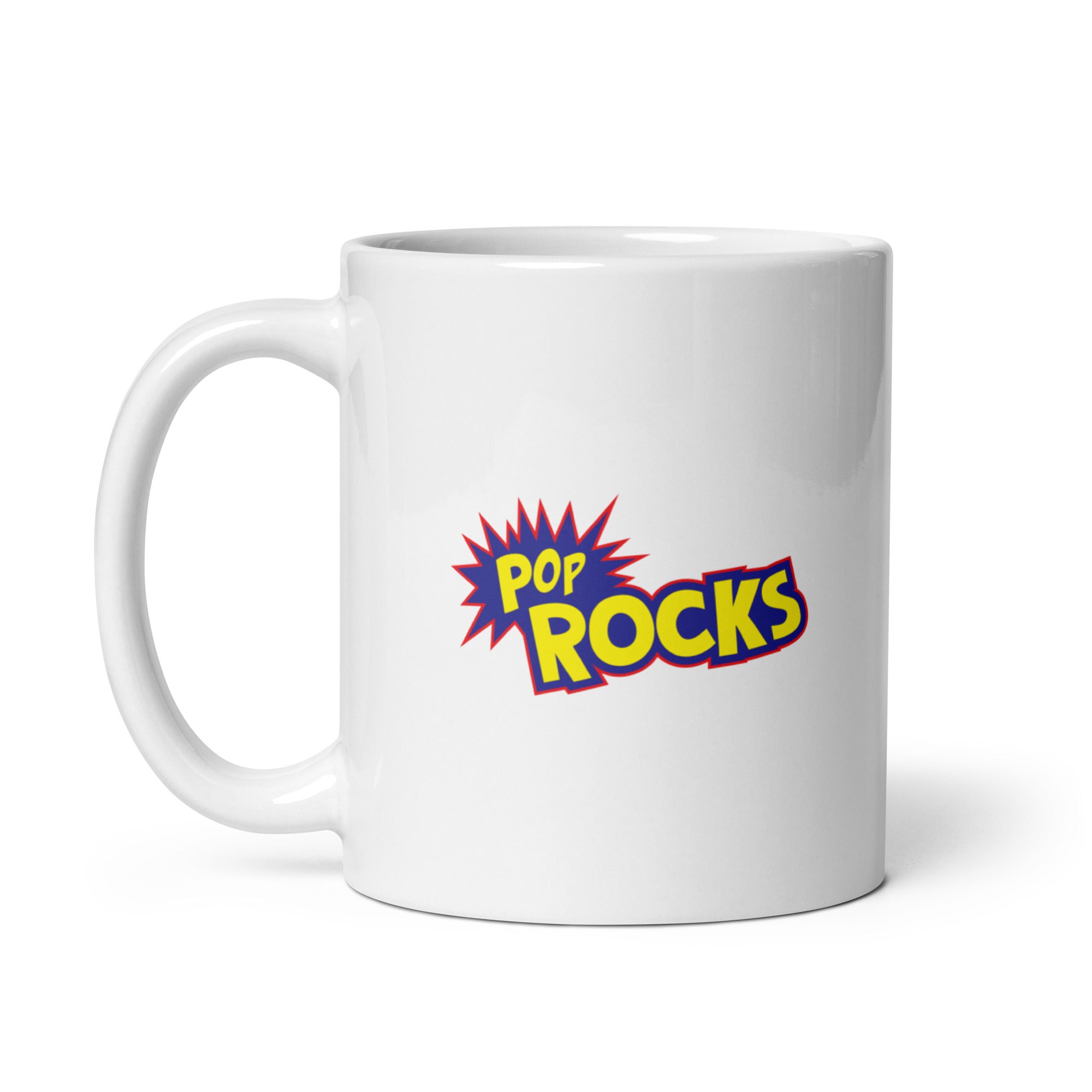 White mug featuring the logo 'POP ROCKS' in blue, yellow and red. A playful font with a starburst design.