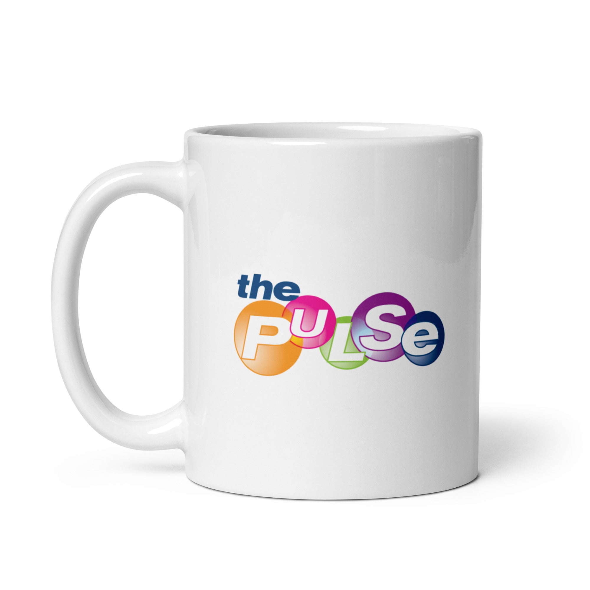 White coffee mug featuring the logo 'the PULSE' in colorful circular designs.